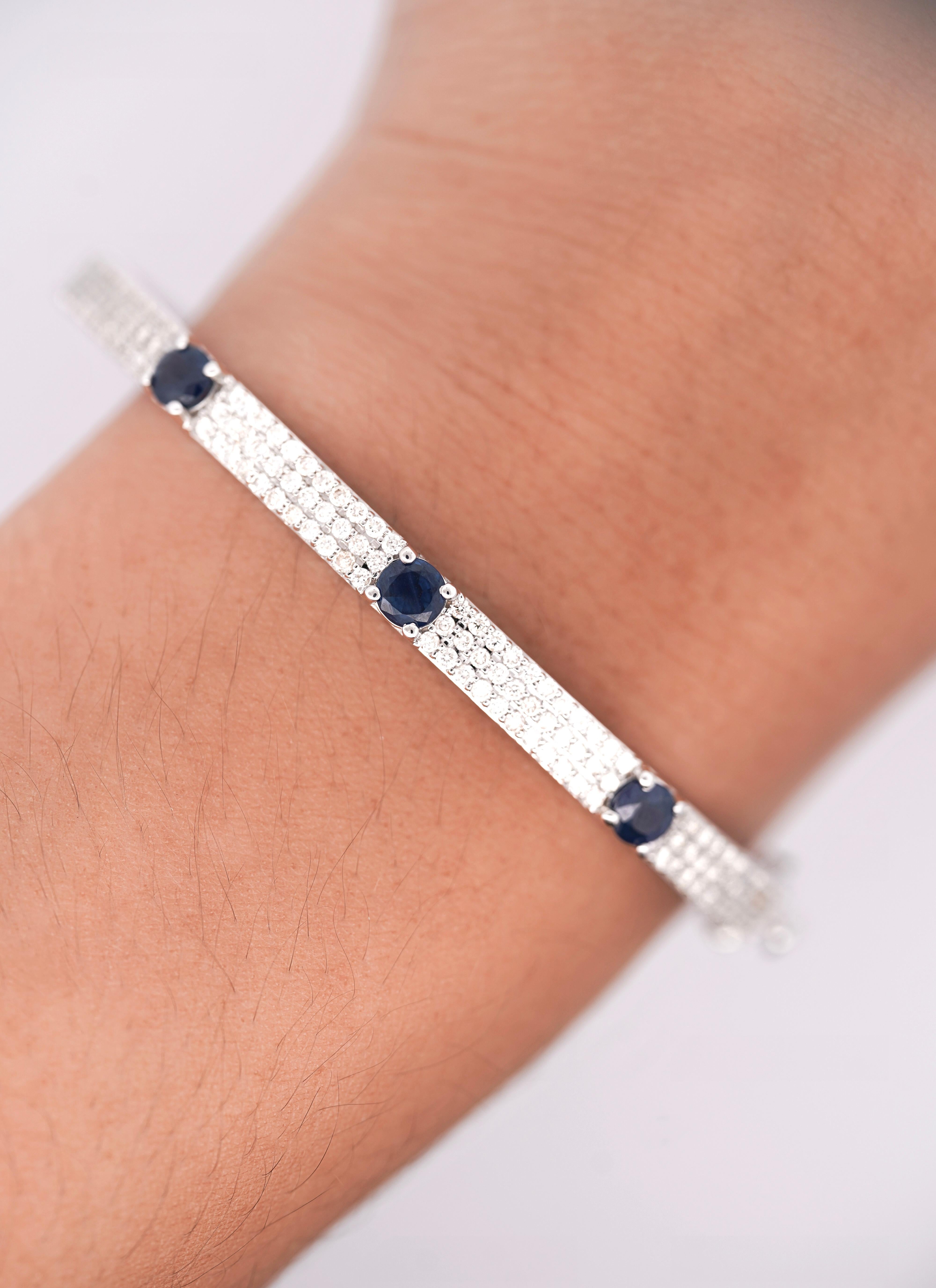 Round Cut 14K White Gold Diamond and Blue Sapphire Pave Bangle Bracelet For Sale