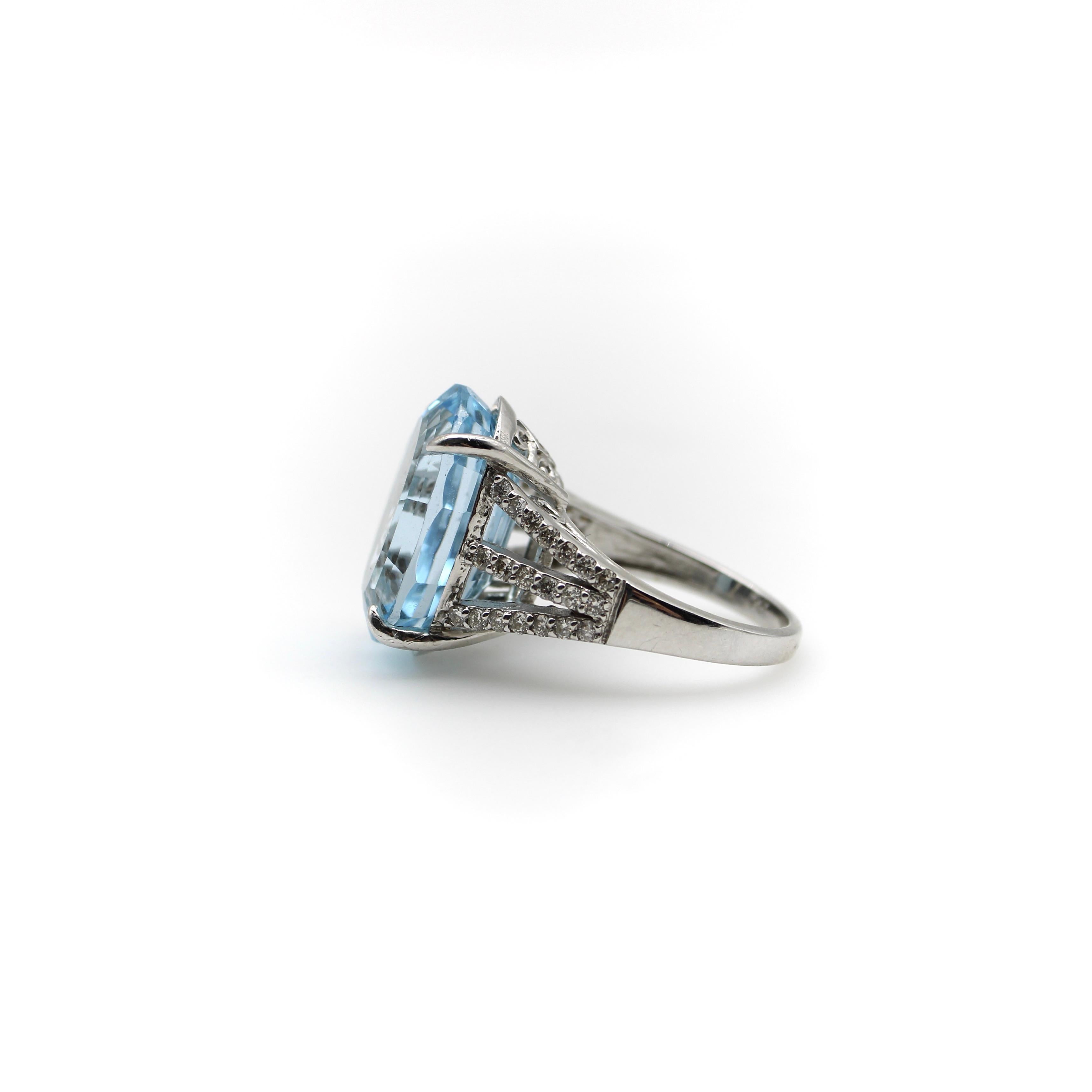 Contemporary 14k White Gold, Diamond, and Blue Topaz Ring 19+ Carats For Sale