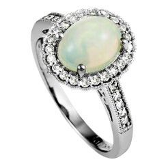 14 Karat White Gold Diamond and Opal Oval Ring