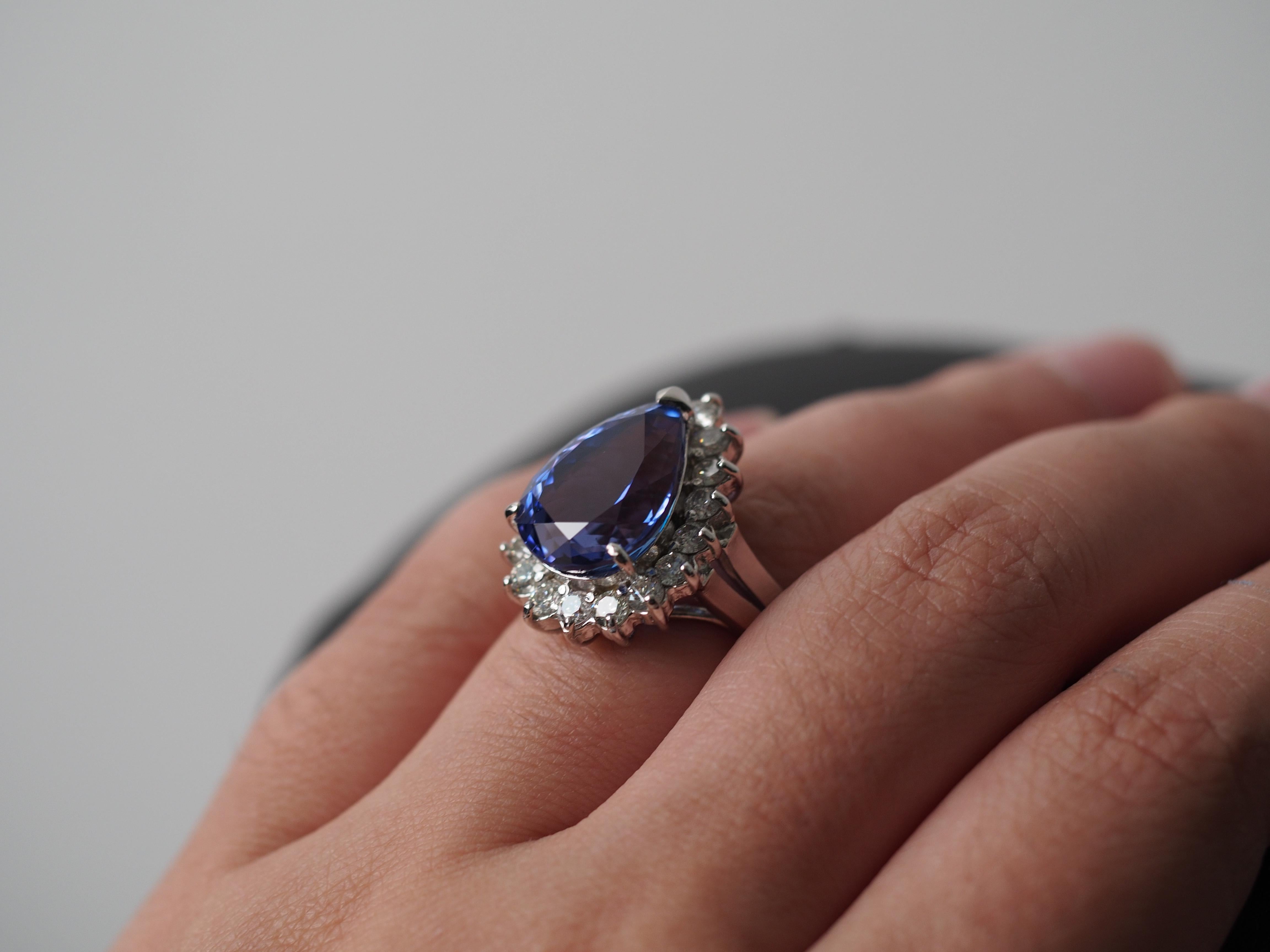 Year: 2000s

Item Details:
Ring Size: 8
Metal Type: 14K White Gold [Hallmarked, and Tested]
Weight: 11.25 grams

‌

Center Tanzanite Details:

GIA Report #:6223950713

Size: 10.00ct

Dimensions: 16.00mm x 12.15mm x 8.40mm

Shape: Pear