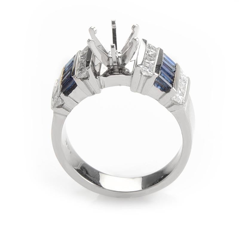 This ring setting is elegant and sophisticated. The setting is made of 14K white gold and boasts a design comprised of ~1.10ct of sapphire baguettes and ~1ct of diamonds.

