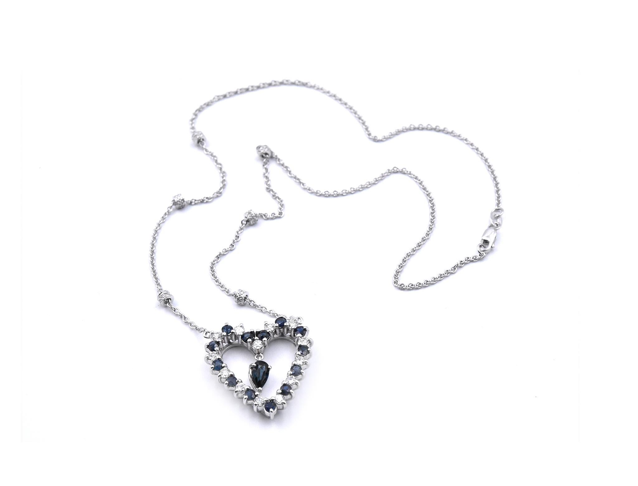 Round Cut 14 Karat White Gold Diamond and Sapphire Dangle Heart Necklace