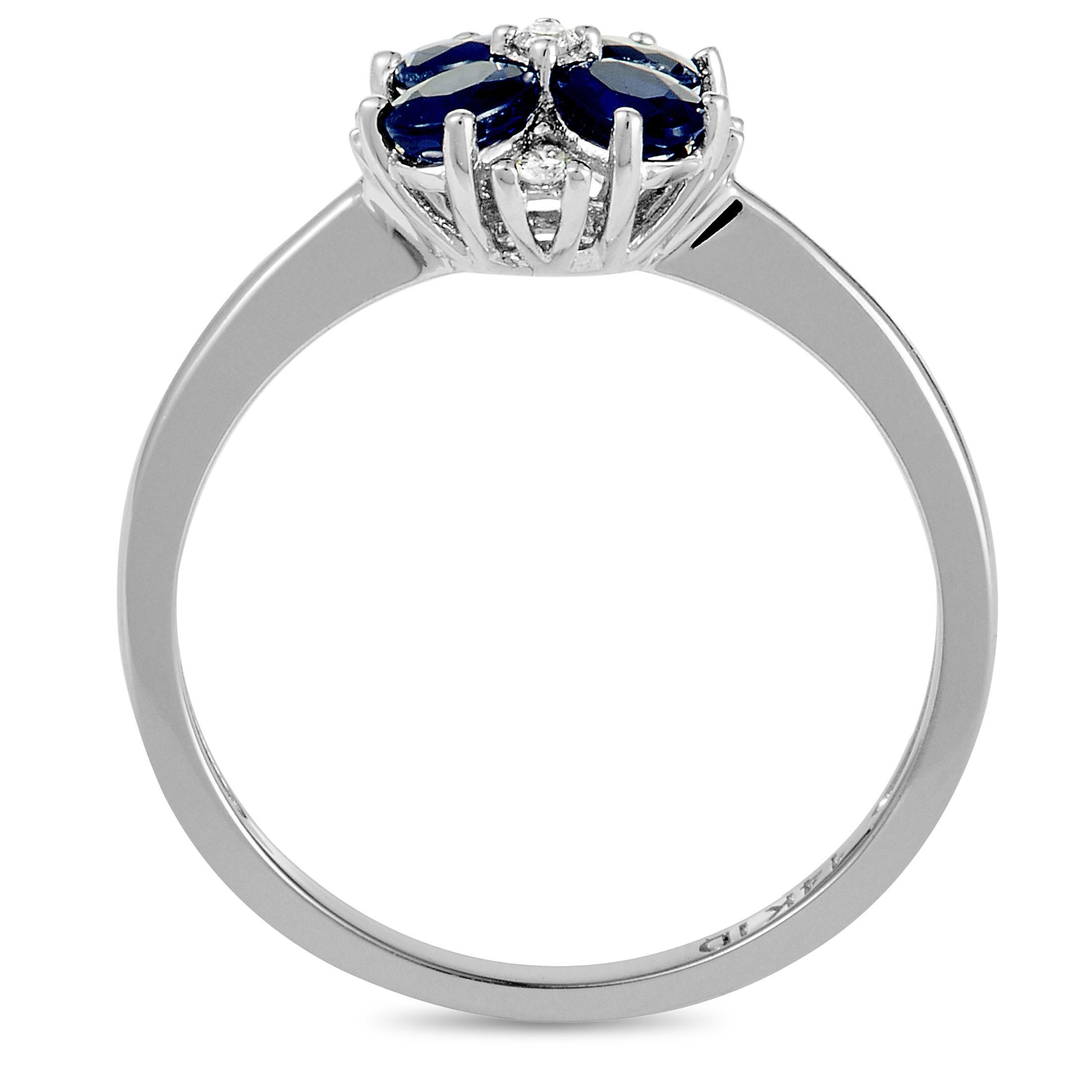 This ring is made of 14K white gold and weighs 2 grams, boasting band thickness of 1 mm and top height of 5 mm, while top dimensions measure 8 by 8 mm. The ring is set with sapphires and with a total of 0.08 carats of diamonds.
 
 Offered in brand