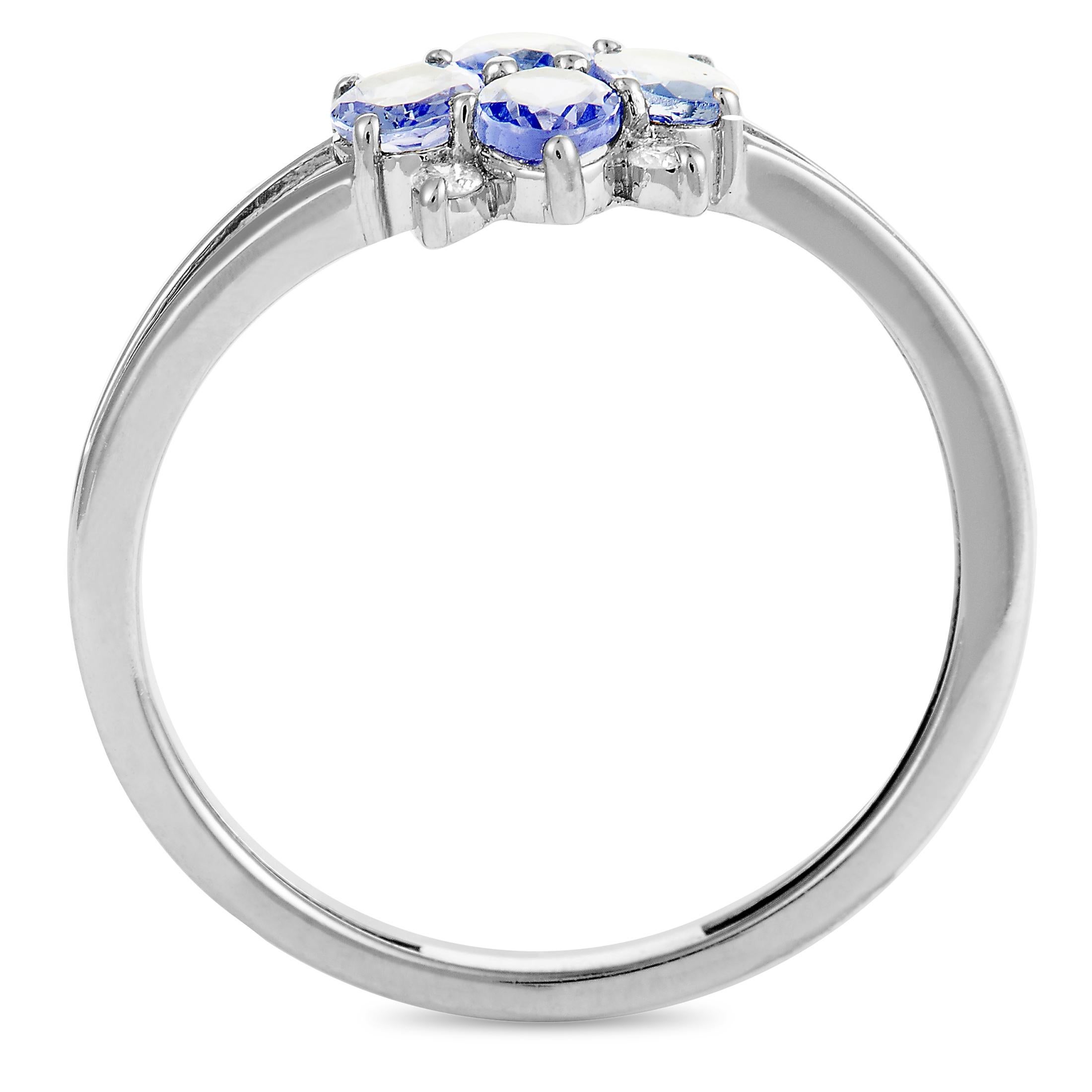 This ring is made of 14K white gold and set with sapphires and a total of 0.06 carats of diamonds. The ring weighs 1.5 grams, boasting band thickness of 1 mm and top height of 3 mm, while top dimensions measure 8 by 8 mm.
 
 Offered in brand new
