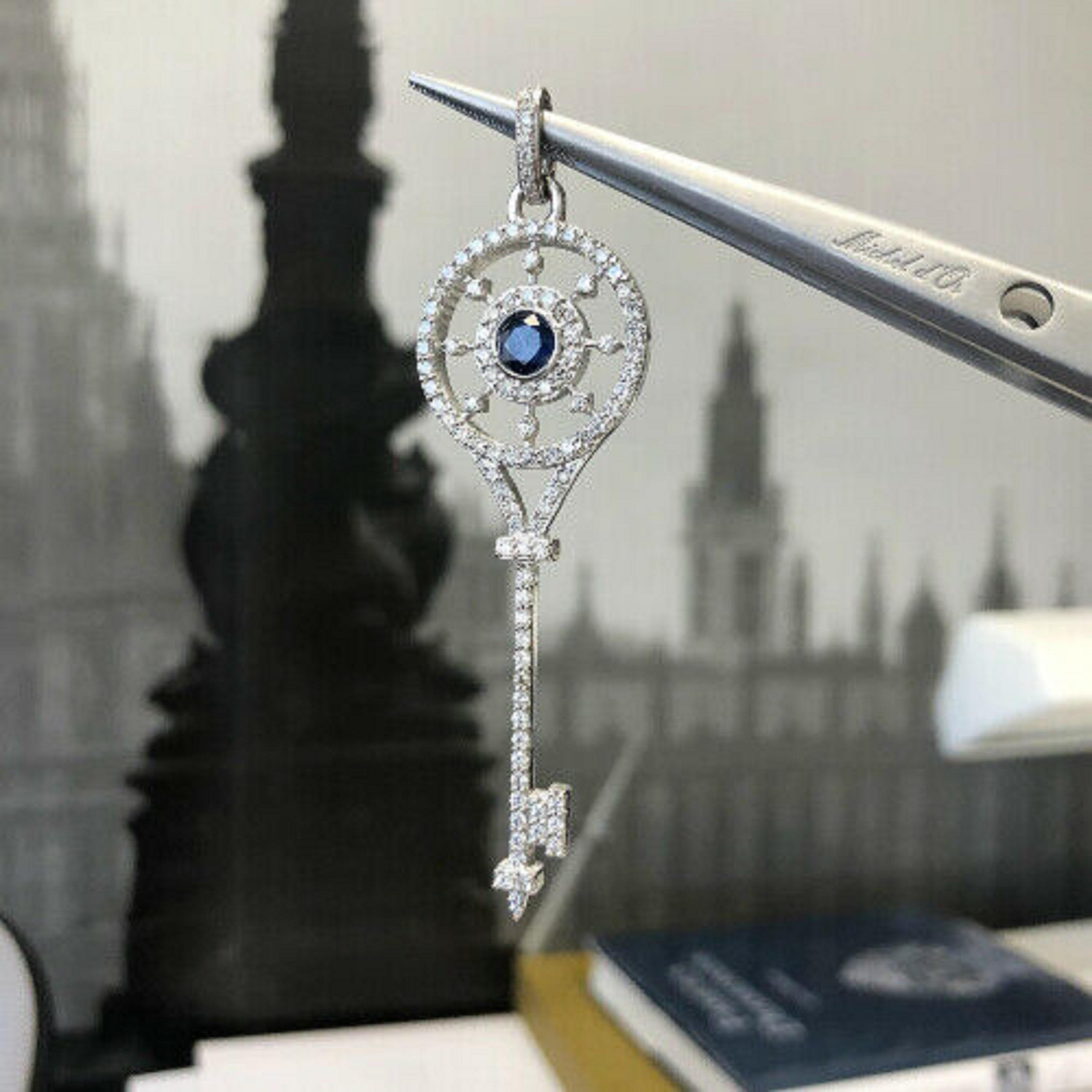 Contemporary 14 Karat White Gold Diamond and Sapphire Paved Key Pendant