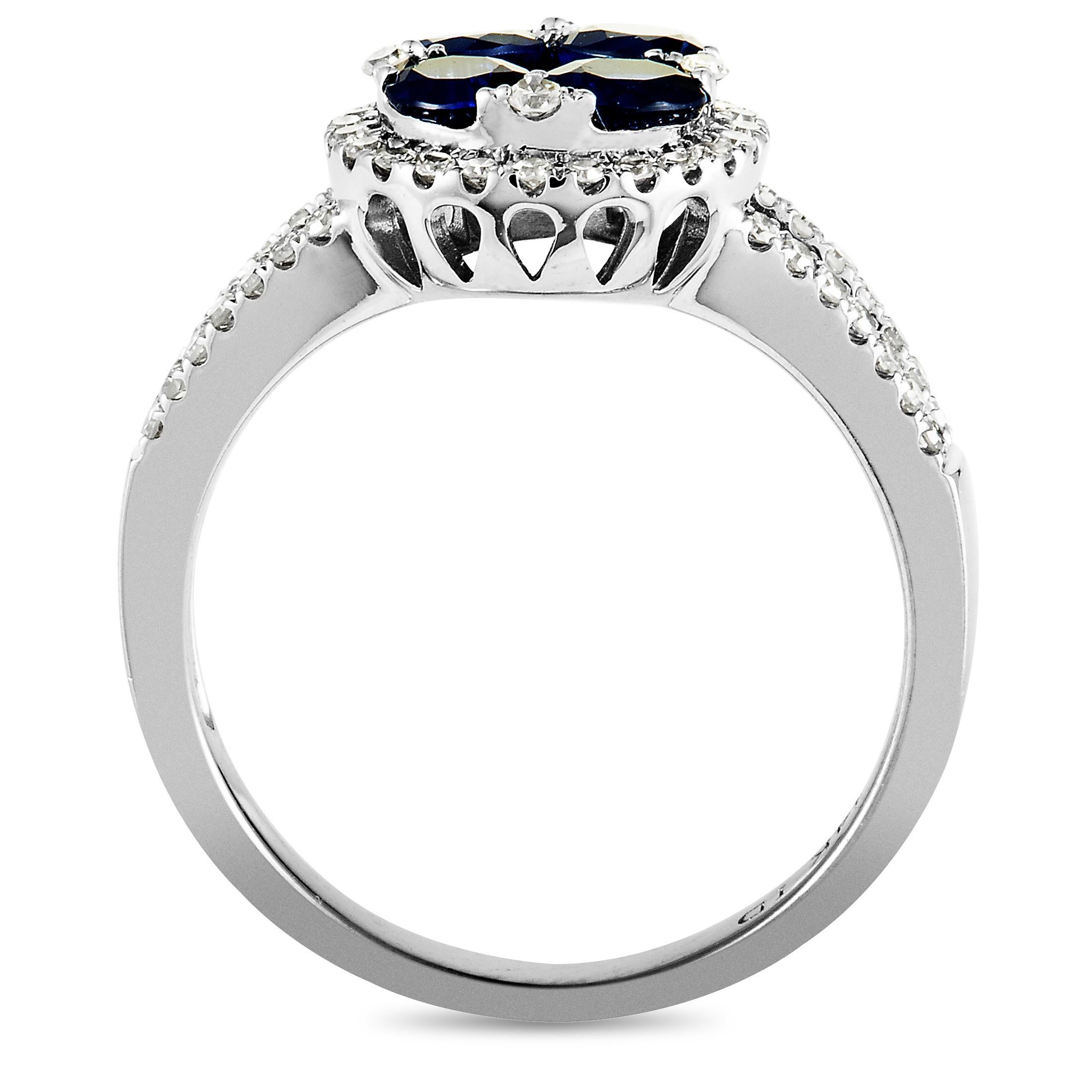 This ring is made of 14K white gold and weighs 3.9 grams. It is set with sapphires and with a total of 0.33 carats of diamonds. The ring boasts band thickness of 3 mm and top height of 5 mm, while top dimensions measure 19 by 11 mm.
 
 Offered in