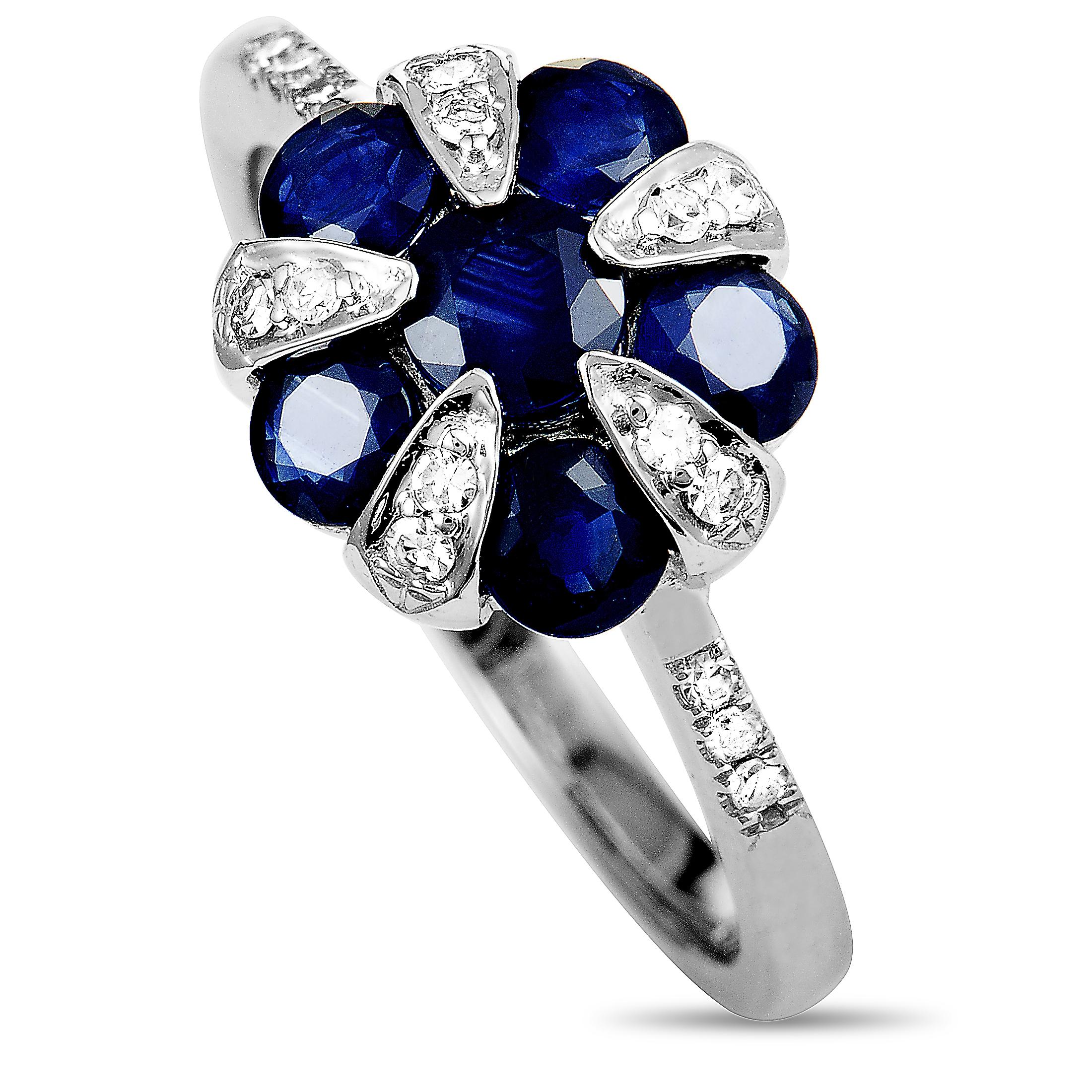 This ring is made of 14K white gold and set with sapphires and a total of 0.11 carats of diamonds. The ring weighs 3.4 grams, boasting band thickness of 2 mm and top height of 5 mm, while top dimensions measure 20 by 10 mm.
 
 Offered in brand new