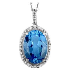 14 Karat White Gold Diamond and Topaz Oval Pendant Necklace