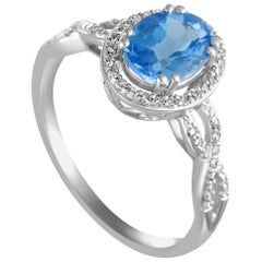 14 Karat White Gold Diamond and Topaz Oval Ring