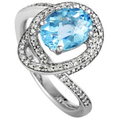 14 Karat White Gold Diamond and Topaz Oval Ring