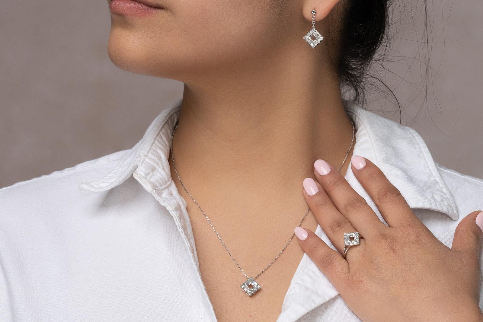 A simple yet stunning piece, this 14k white gold diamond pendant embodies the meaning of elegant everyday fine jewelry. The pendant features solely baguette diamonds that creates a sharp and clean geometric look that’s universal in style. Wear it