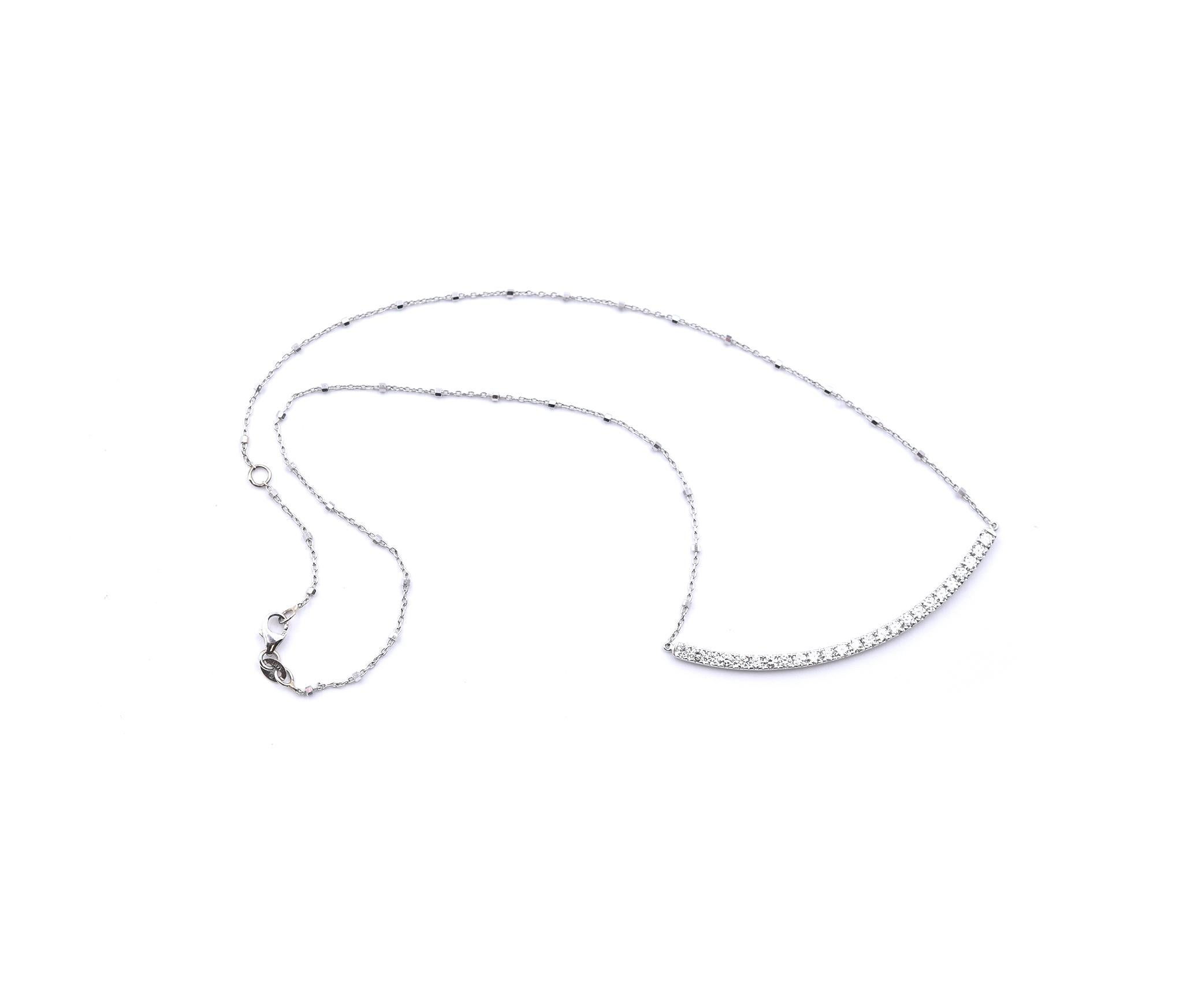 Material: 14k white gold
Diamonds: 25 round brilliant cuts = 1.03cttw
Color: G
Clarity: VS
Dimensions: necklace measures 16-inches in length, pendant measures 56.55mm x 2.55mm
Weight: 4.45 grams