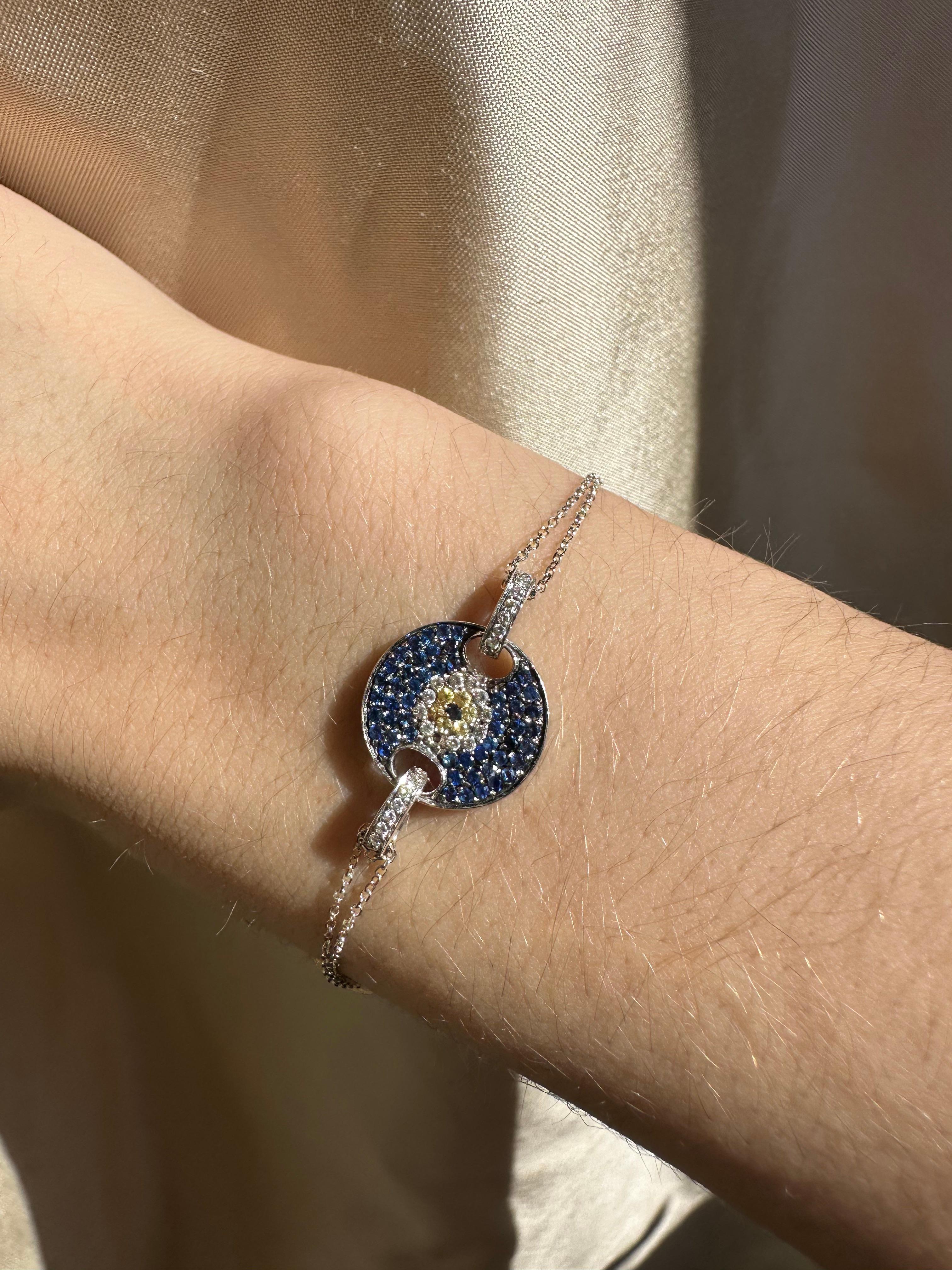 14K White Gold Diamond, Blue and Yellow Sapphire Evil Eye Bracelet In Good Condition For Sale In New York, NY