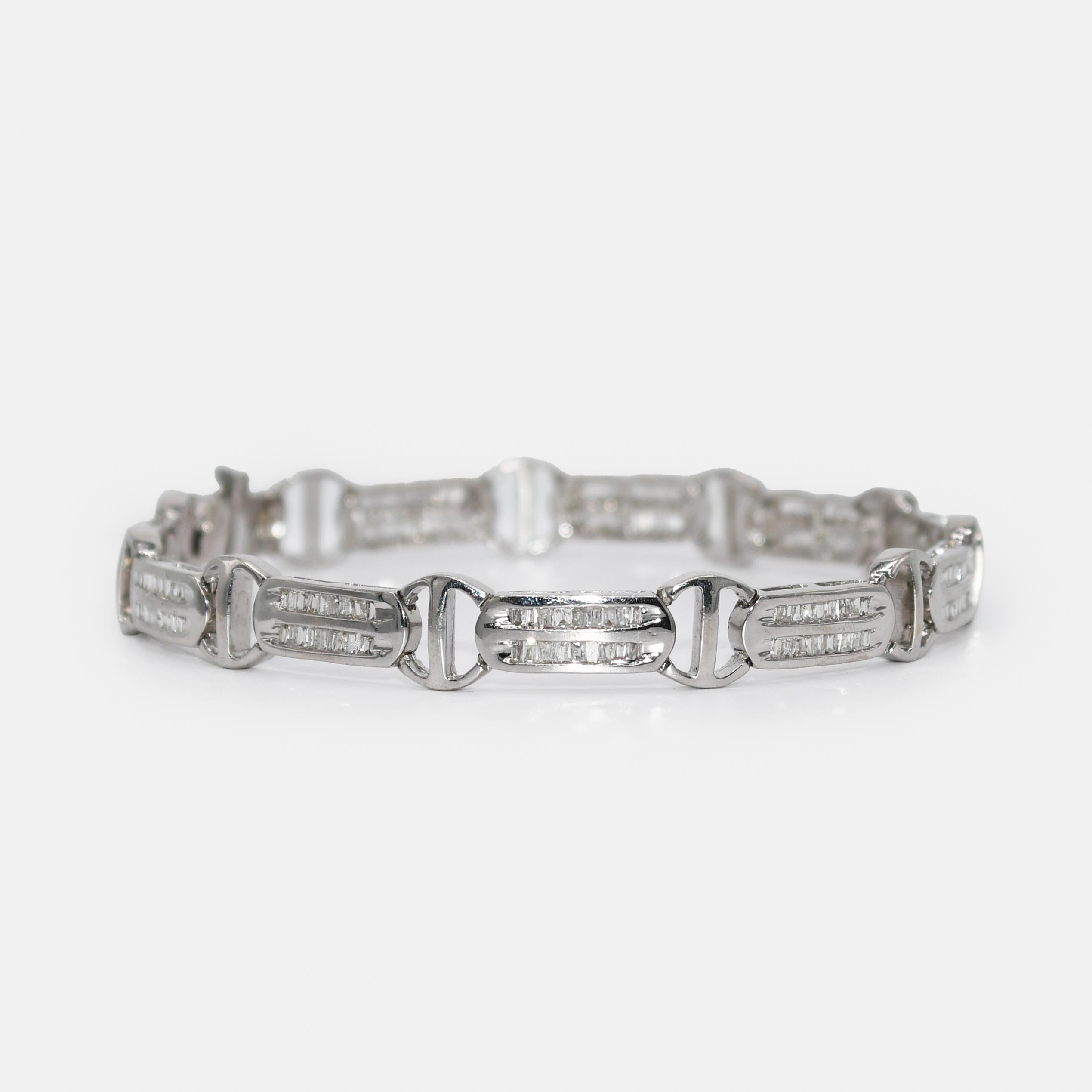 14K White Gold Diamond Bracelet 1.50tdw, 14.3g
Ladies 14k white gold and diamond bracelet.
Stamped 14k and weighs 14.3 grams gross weight.
The diamonds are baguette cuts, 1.50 total carats, i to j color, Si to i1 clarity.
The bracelet measures 7 1/4