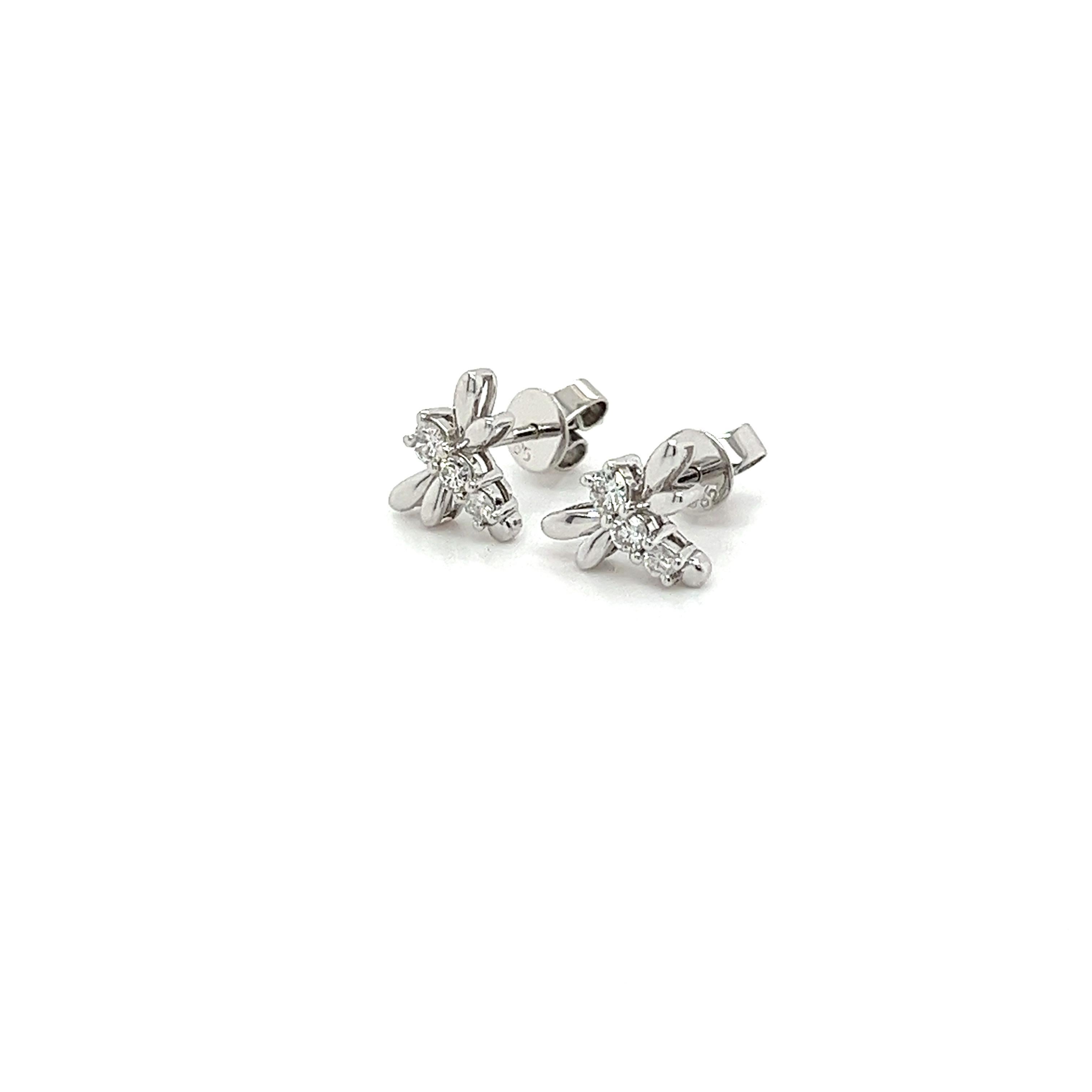 Natural round cut diamond Dragonfly stud earrings set in 14-karat solid white gold. Safely mounted with a strong push-back closure and 2 tightness levels for additional flexibility and security. Carat weight and gold kt stamped. 

100% water-proof.