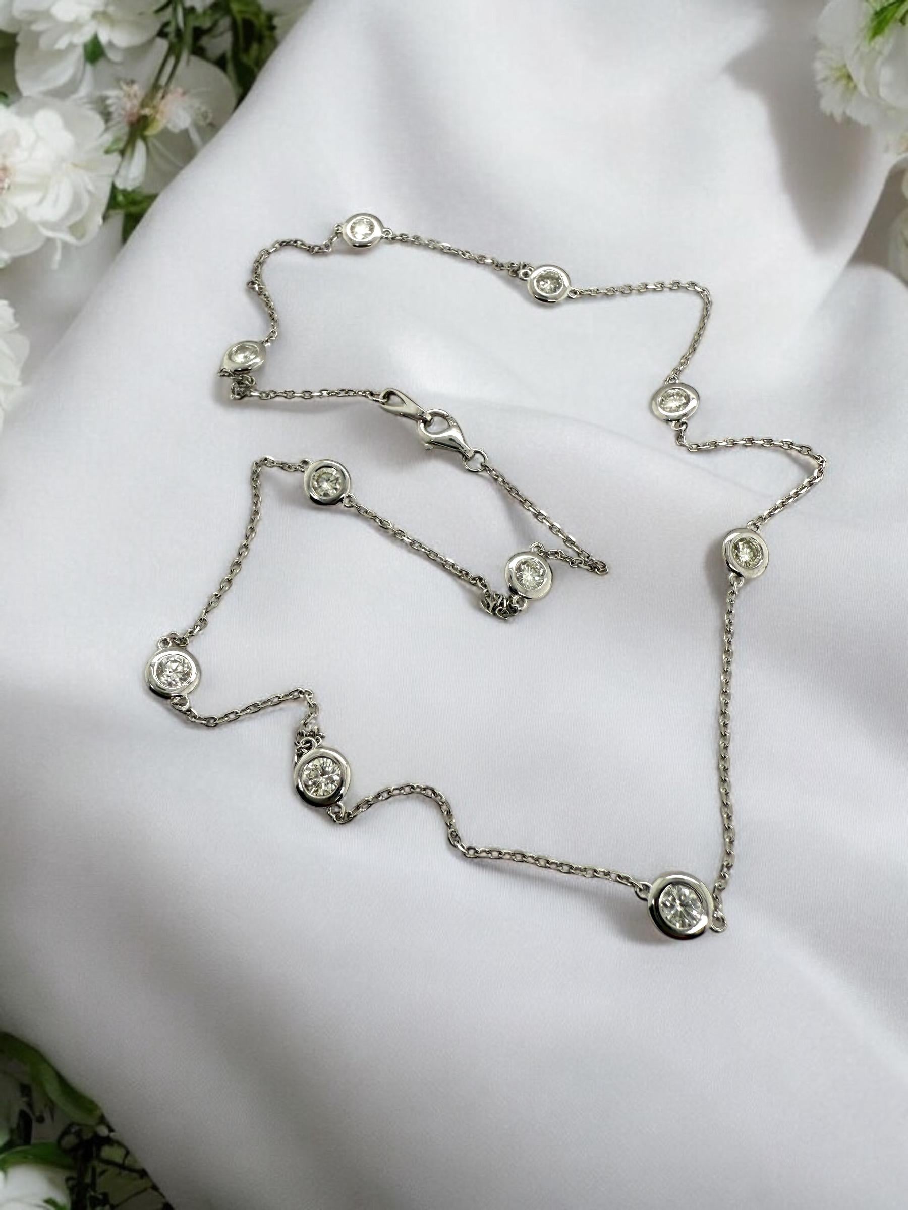 This lovely necklace is absolutely perfect to stack or wear alone!

Necklace Details
Material: 14K White Gold
Length: 18 Inches
Weight: 4.3 Grams

Accented by the following gemstones
10 - 3.5mm Round Brilliant Cut Diamonds; GH Color; SI Clarity;