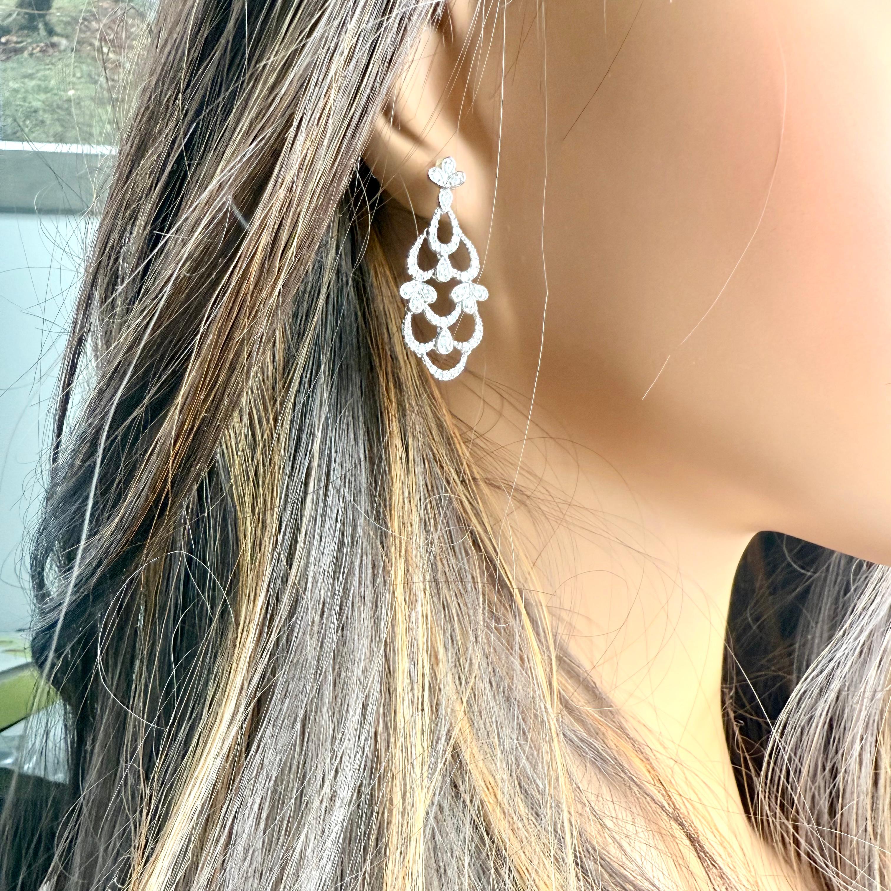 A Brilliant Statement of Graceful Glamour
Enhance your look with these preowned 14K White Gold Diamond Chandelier Earrings, each showcasing an enchanting cascade of diamonds totaling approximately 1.02 carats. Designed in a stylish drop silhouette,