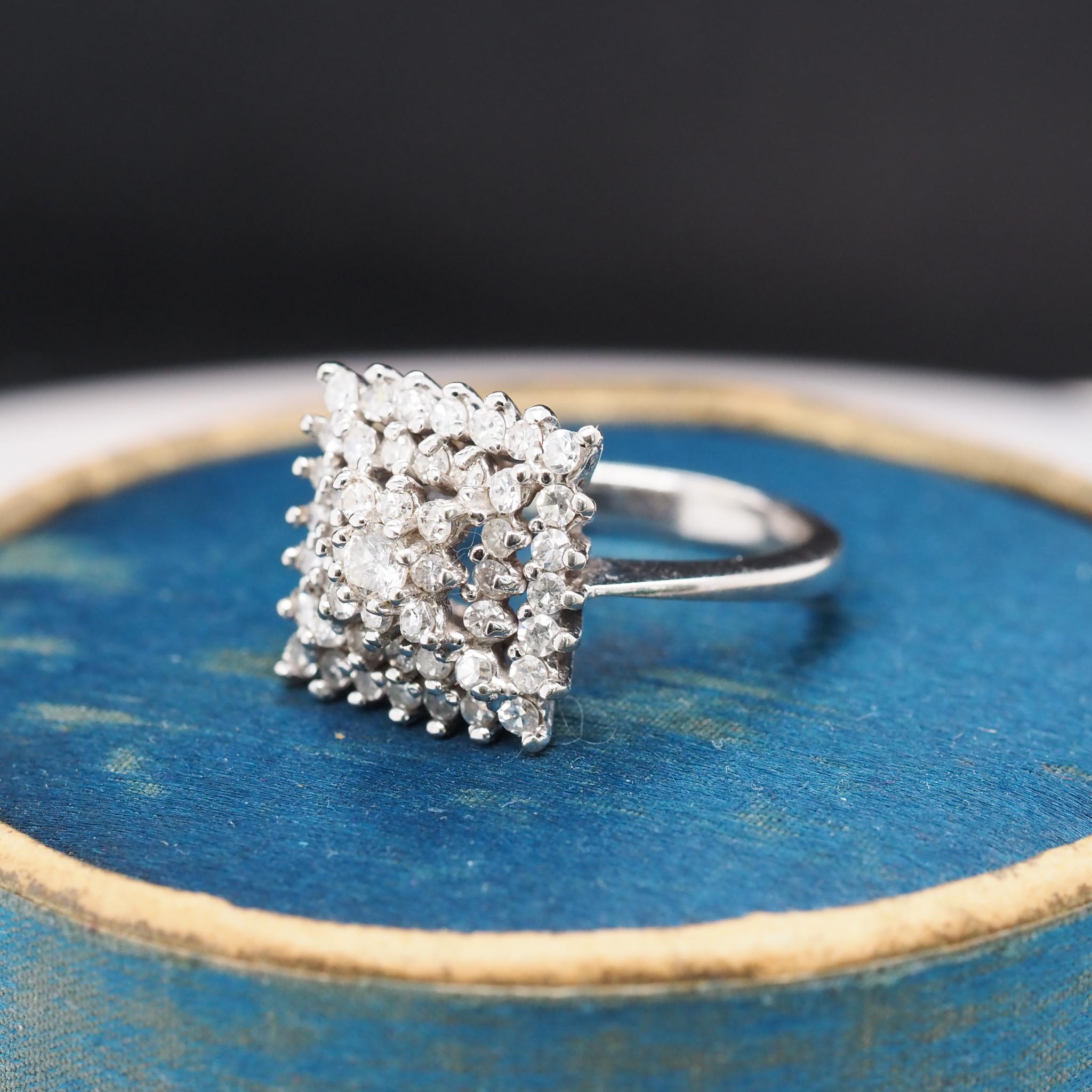 Ring Size: 6.5
Metal Type: 14k White Gold  [Hallmarked, and Tested]
Weight:  5.9 grams



Diamond Details:

Weight: .75ct, total weight

Cut: Round Brilliant

Clarity: SI-I

Color: I/J

Band Width: 2.5 mm
Condition:  Excellent