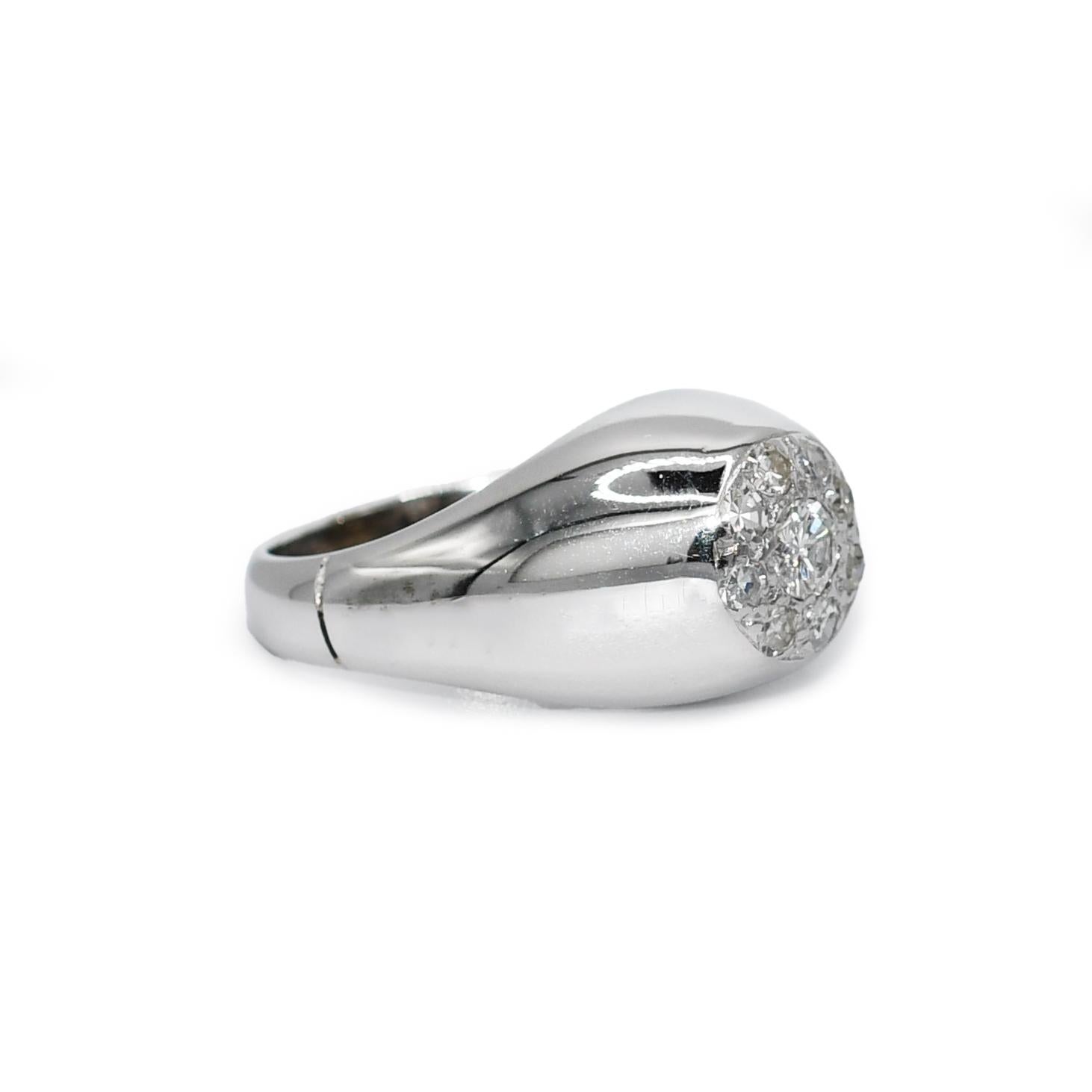 Ladies 14k white gold and diamond cocktail ring.
Tests 14k using an electronic tester. The gross weight is 9.5 grams.
The center diamond is a round brilliant cut approximately .20 to .22 carats, G to H color, Si clarity.
There are round, single-cut