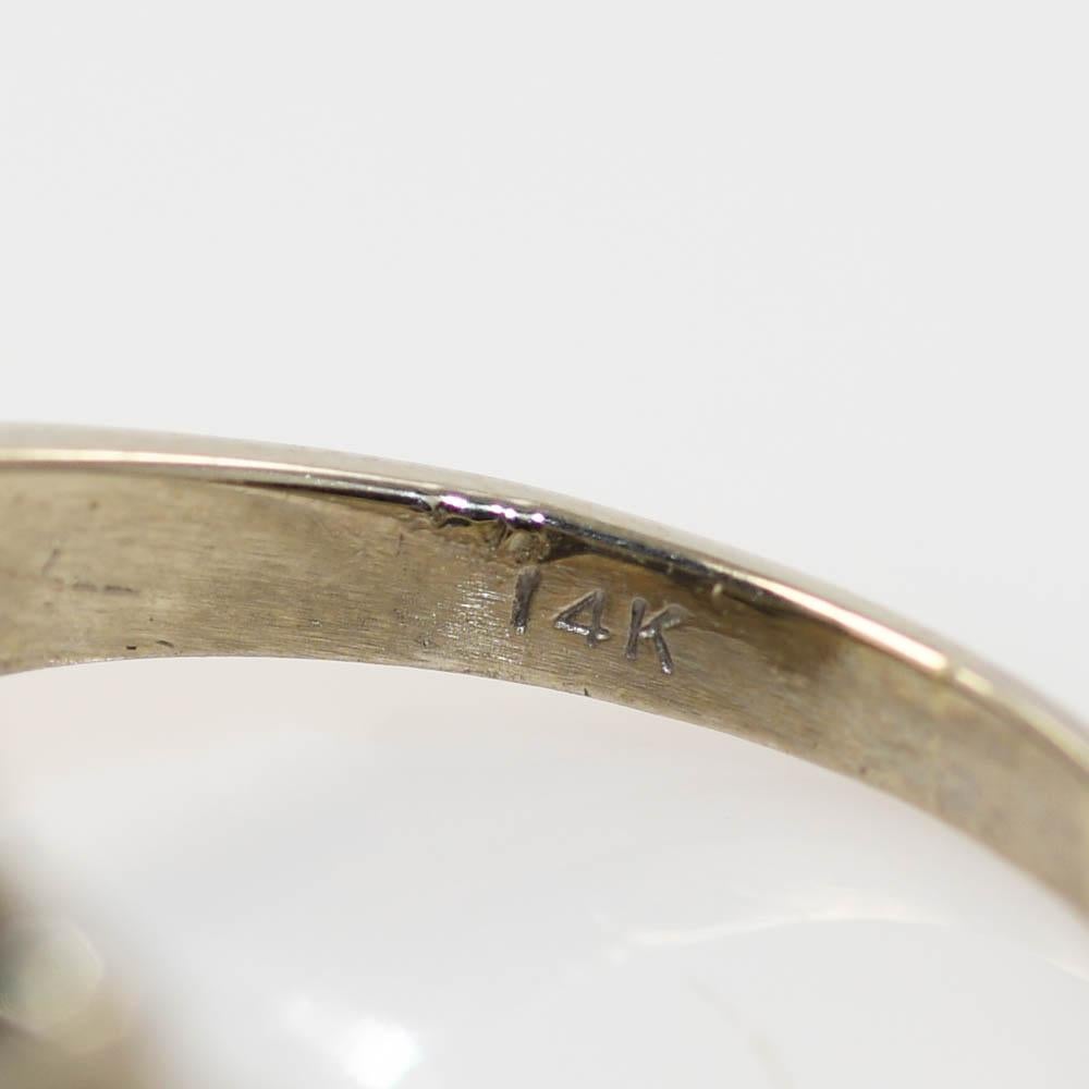 14K white gold diamond cluster ring.
There is 2.30tdw, the center stone is .30ct, and the rest range from .10ct - .15ct each.
SI1-I1 Clarity, H-I Color, Very good cuts
size 6 1/2
Stamped and tests 14k.
Very nice piece, like new!