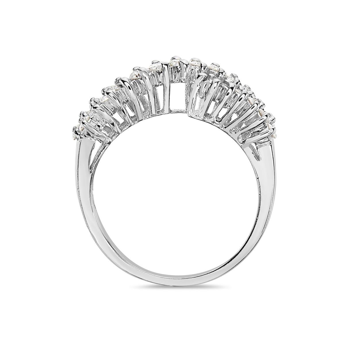 This cocktail ring features 0.85 carats of diamonds set in 14K white gold. 25 total diamonds. 5 grams total weight. Size 7.5.

Resizeable upon request.

Viewings available in our NYC showroom by appointment.