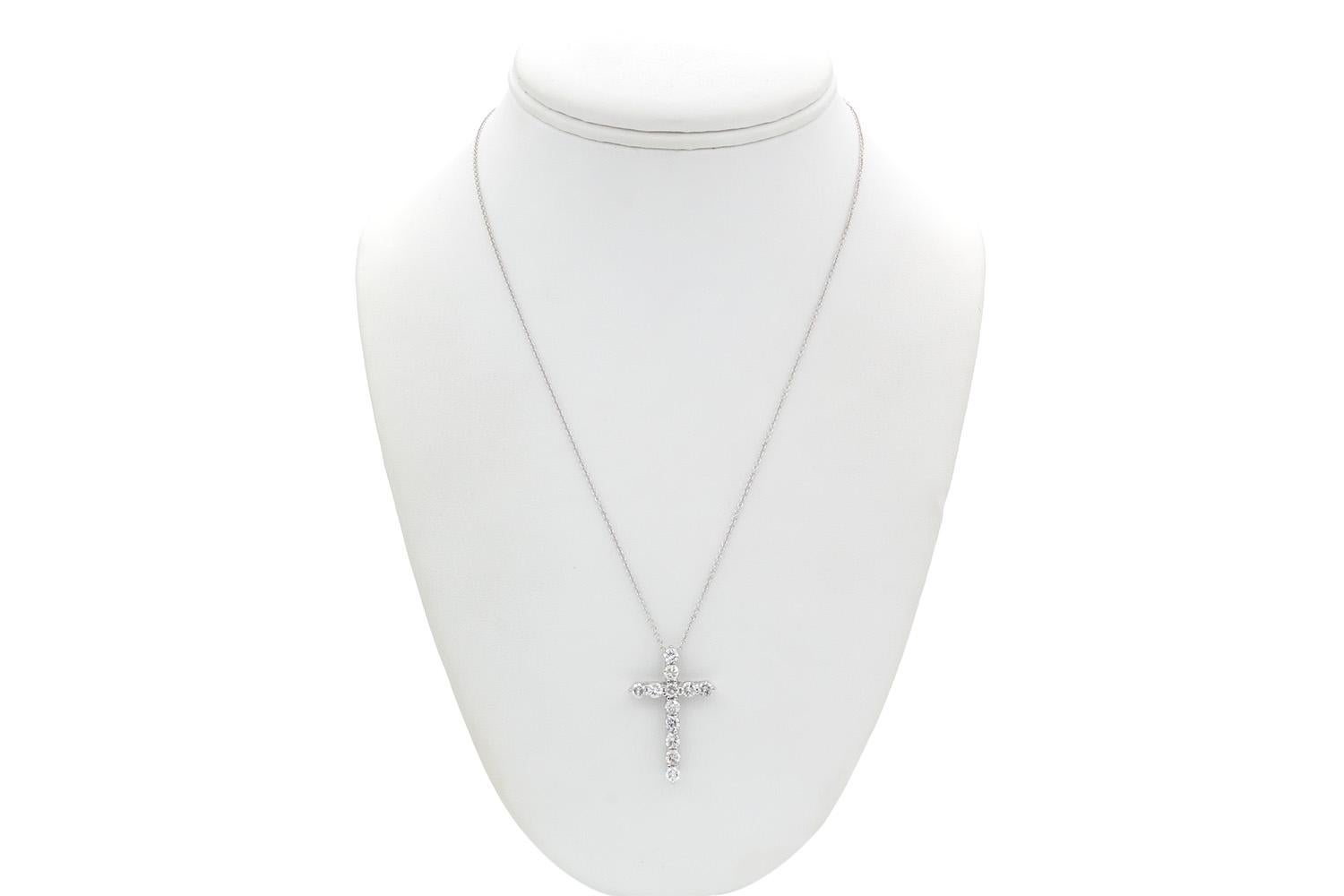 We are pleased to present this 14k White Gold & Diamond Cross Crucifix Pendant Necklace. This stunning piece features 1.80ctw H-I/SI2-I1 round brilliant cut diamonds set in a 14k white gold cross pendant on a 14k white gold chain which is adjustable