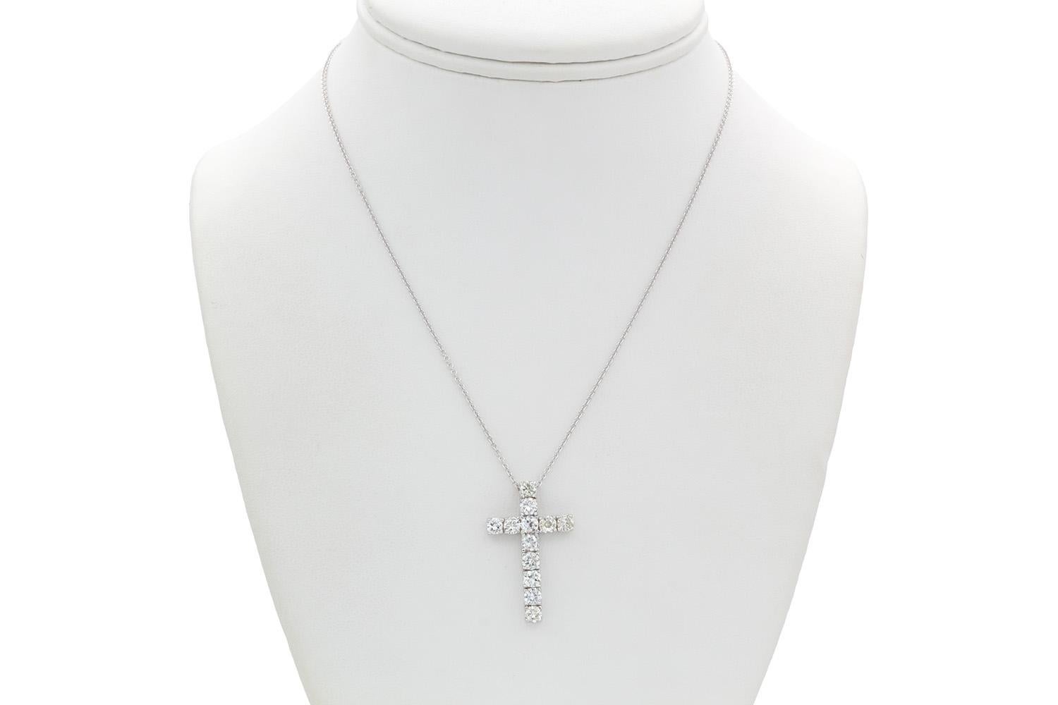 We are pleased to present this 14k White Gold & Diamond Cross Crucifix Pendant Necklace. This stunning piece features 2.00ctw H-J/VS2-SI1 round brilliant cut diamonds set in a 14k white gold cross pendant on a 14k white gold chain which is