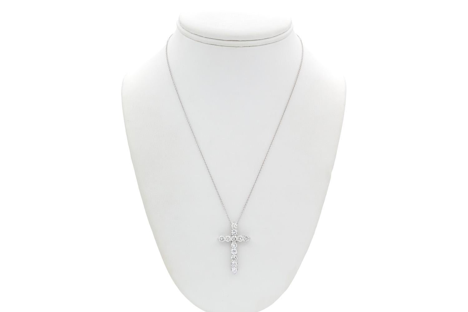 We are pleased to present this 14k White Gold & Diamond Cross Crucifix Pendant Necklace. This stunning piece features 2.50ctw H-J/VS2-SI1 round brilliant cut diamonds set in a 14k white gold cross pendant on a 14k white gold chain which is