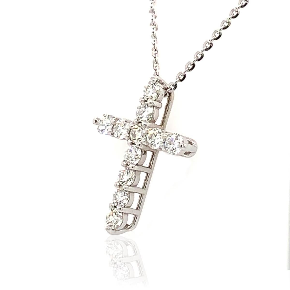 Eleven brilliant shared prongs round diamonds make up this spectacular cross pendant crafted in 14k white gold.

Product details: 

Center Gemstone Type: NATURAL DIAMOND
Center Gemstone Color: WHITE
Center Gemstone Shape: ROUND
Metal: 14K White