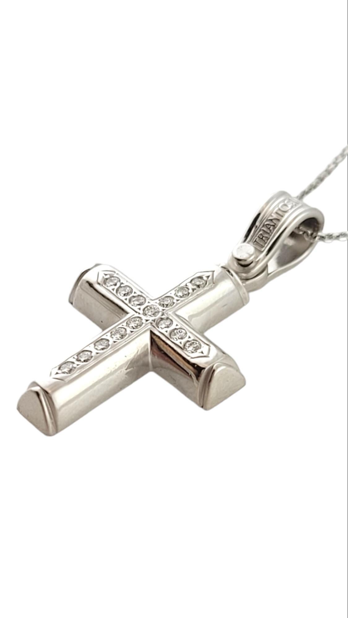 Vintage 14K White Gold Diamond Cross Pendant Necklace

This gorgeous 14K gold cross pendant features 15 sparkling round brilliant cut diamonds and is paired with a beautiful 14K gold chain!

Approximate total diamond weight: .15 cts

Diamond color: