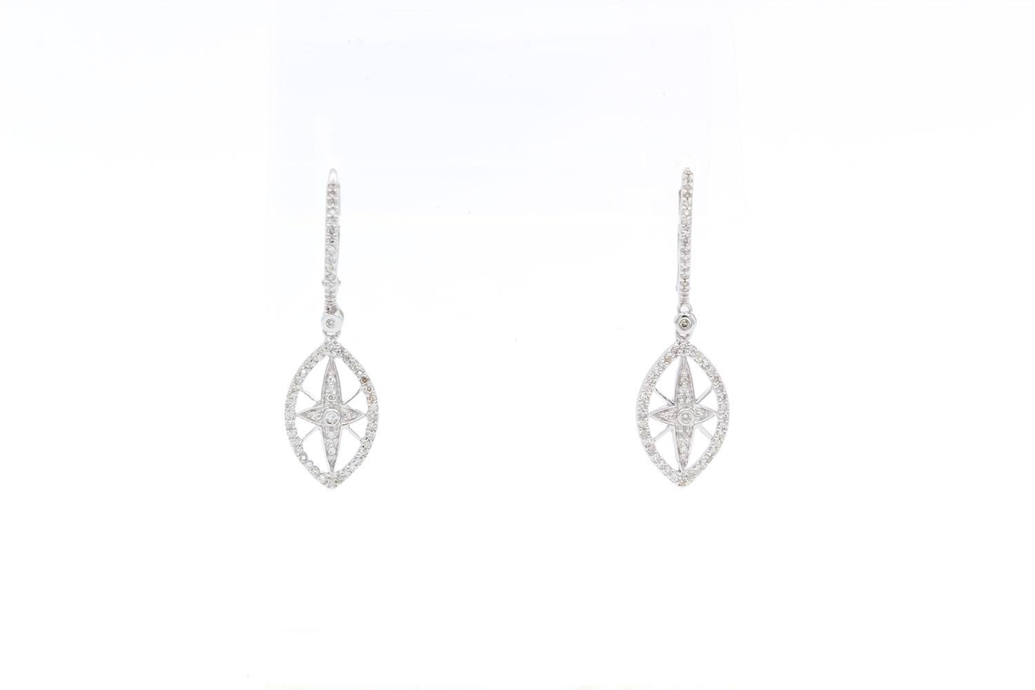 We are pleased to present these Ladies 14k White Gold & Diamond Dangle Drop Earrings. This elegant set of dangle earrings features a beautiful design set with and estimated 0.40ctw H-I/VS-SI Round Brilliant Cut Diamonds with a hinged backing. The