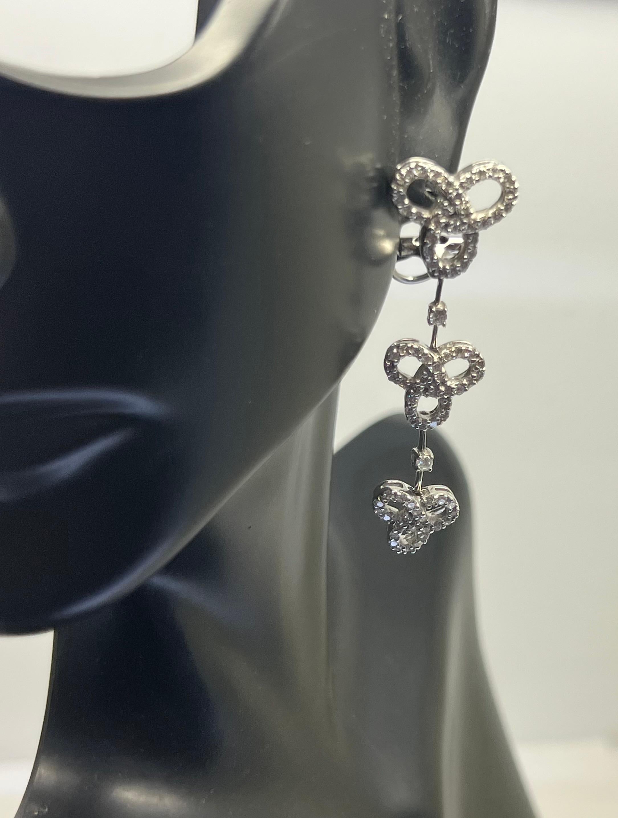 Modern 14k White Gold Diamond Dangle Drop Infinity Leaver Back Earrings For Sale