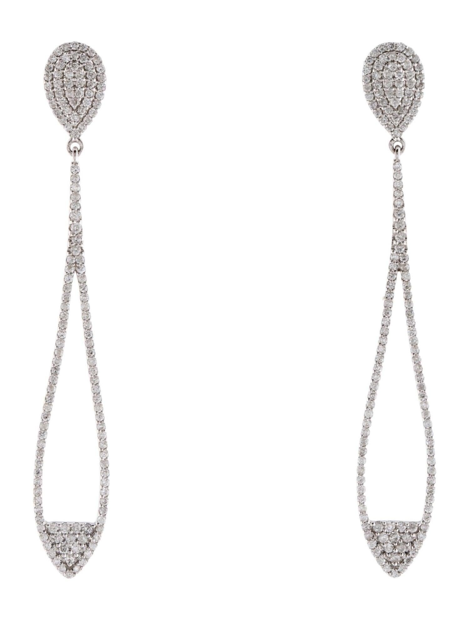 Introducing our captivating 14K White Gold Diamond Drop Earrings, a stunning addition to any fine jewelry collection. These earrings feature a total of 276 round brilliant diamonds, weighing in at 0.55 carats. Each diamond has been meticulously