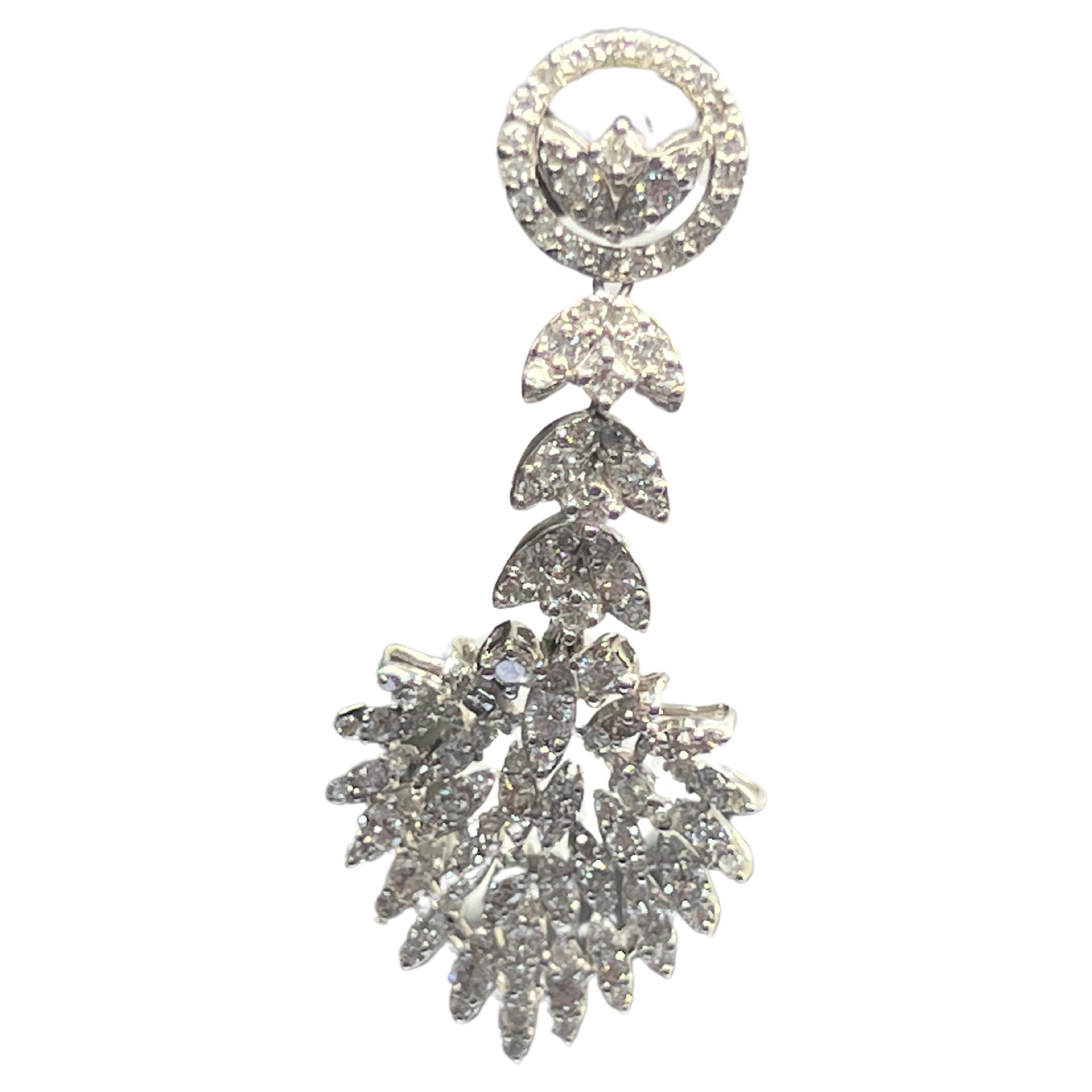 Add a touch of elegance to your look with these 14k White Gold Diamond Drop Flower Dangle Earrings. Crafted with natural, round-shaped diamonds in a beautiful flower shape, these earrings are sure to catch the eye. The delicate dangle/drop style