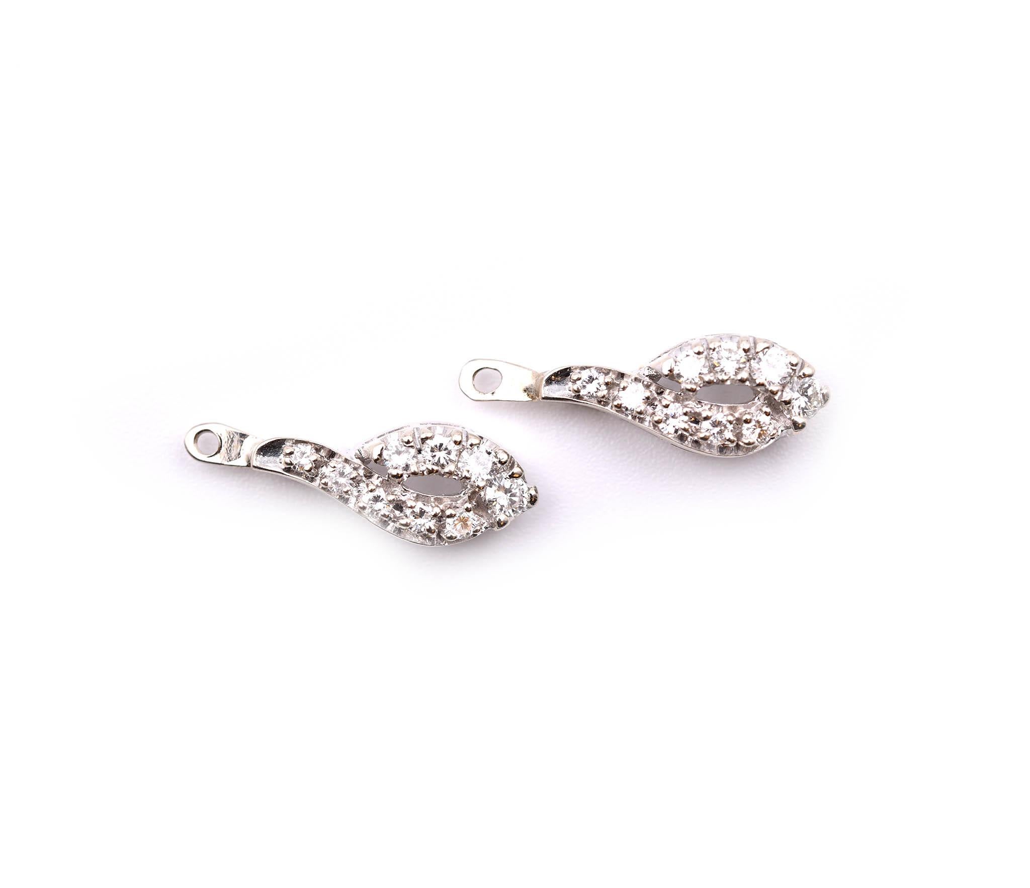 Designer: custom design
Material: 14k white gold
Diamonds: 12 rount cut = .55cttw
Color: G/H
Clarity: SI1-SI2
Dimensions: each earring enhancer is 19.72mm long and 6.50mm wide
Weight: 2.19 grams