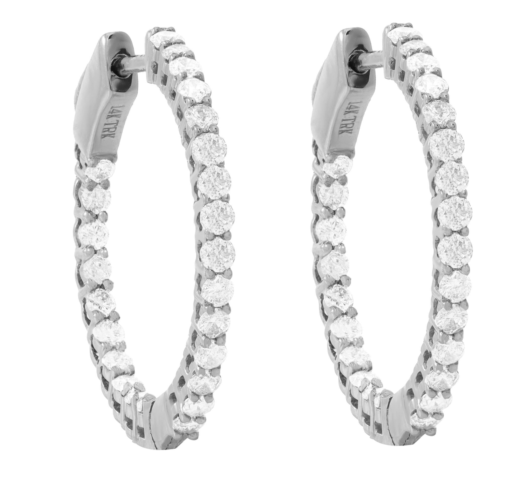 14K White Gold Diamond Earrings featuring 1.00 Carat T.W. of Natural Diamonds

Underline your look with this sharp 14K White Gold Diamond Hoop Earrings. High quality Diamonds. This Earrings will underline your exquisite look for any occasion.

. is