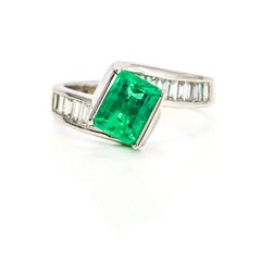 14 Karat White Gold Diamond Emerald Bypass Ring