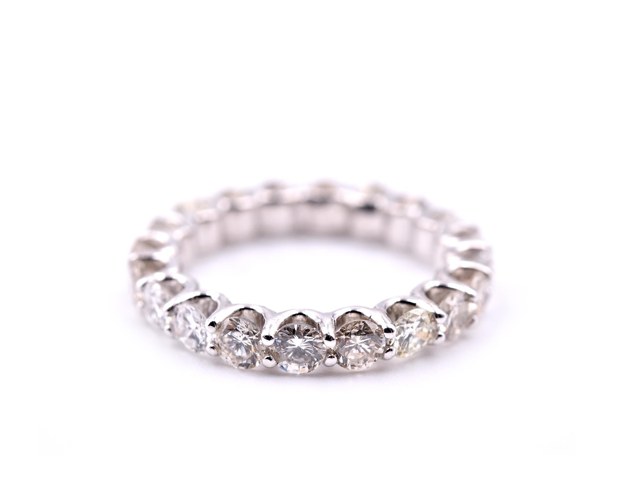 Designer: custom design
Material: 14k white gold
Diamonds: 20 round brilliant cut= 2.70cttw
Color: H
Clarity: SI1
Ring size: 6 
Dimensions: ring is approximately 3.40mm wide
Weight: 3.51 grams 
