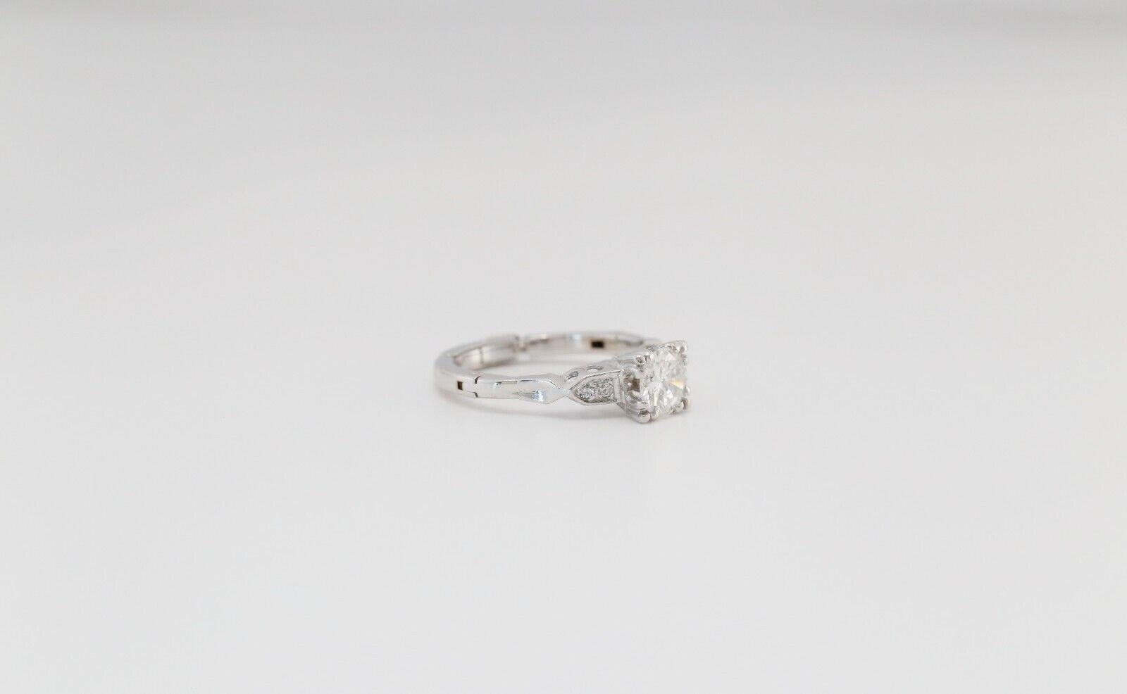 This elegant 14k white gold Finger Fit ring features a unique hinged design that opens to accommodate larger knuckles while closing securely for a snug, comfortable fit. Though it wears as a size 5.5 on the finger, the hidden mechanism expands the