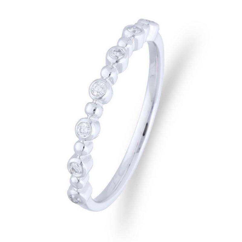 Diamond Carat Weight: This exquisite Gazebo Fancy Collection ring features a total of 0.09 carats of round diamonds set with precision in a bezel setting. The diamonds provide a subtle yet radiant shimmer to the ring.

Elegant Diamond Placement: The