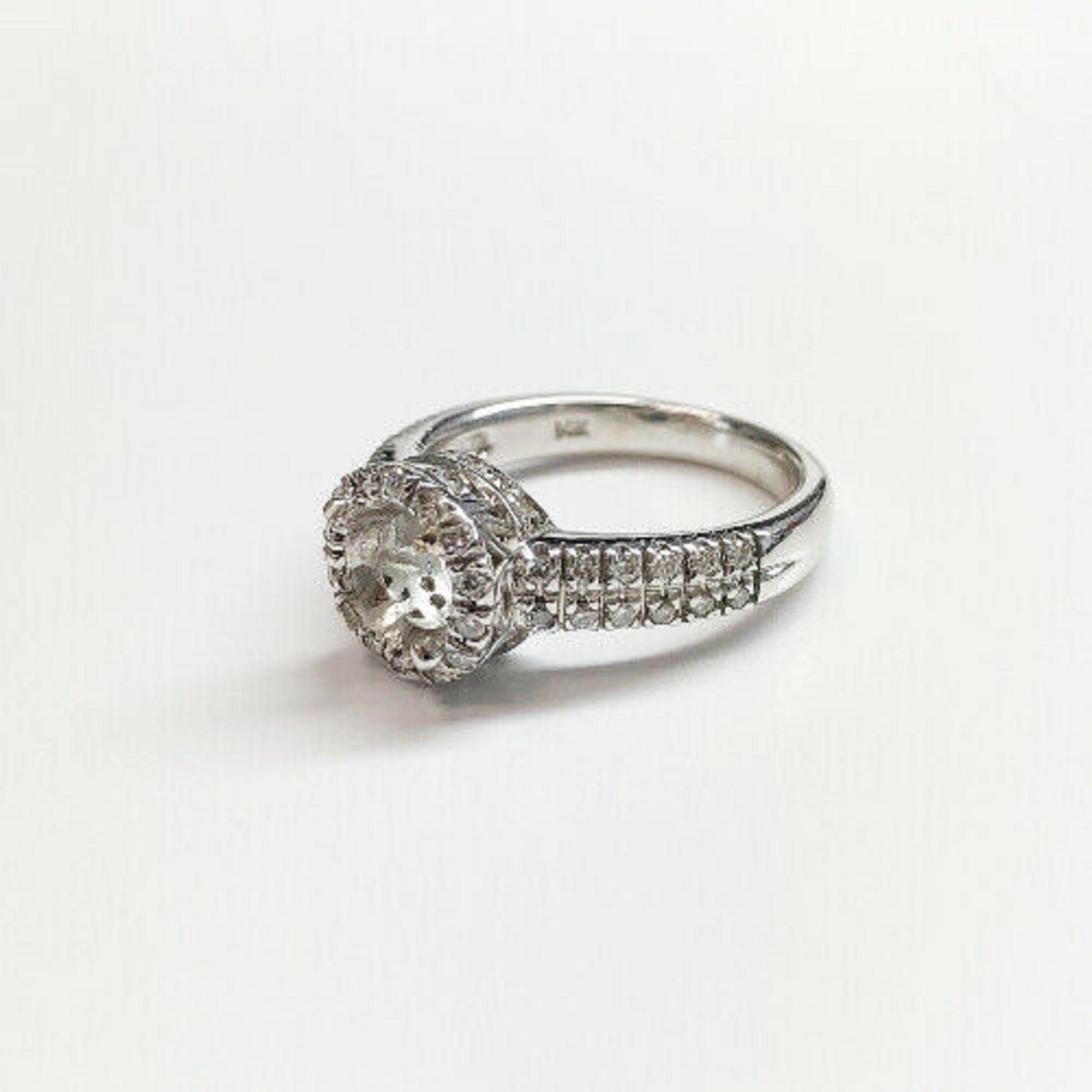 Contemporary 14 Karat White Gold Diamond Halo Ring