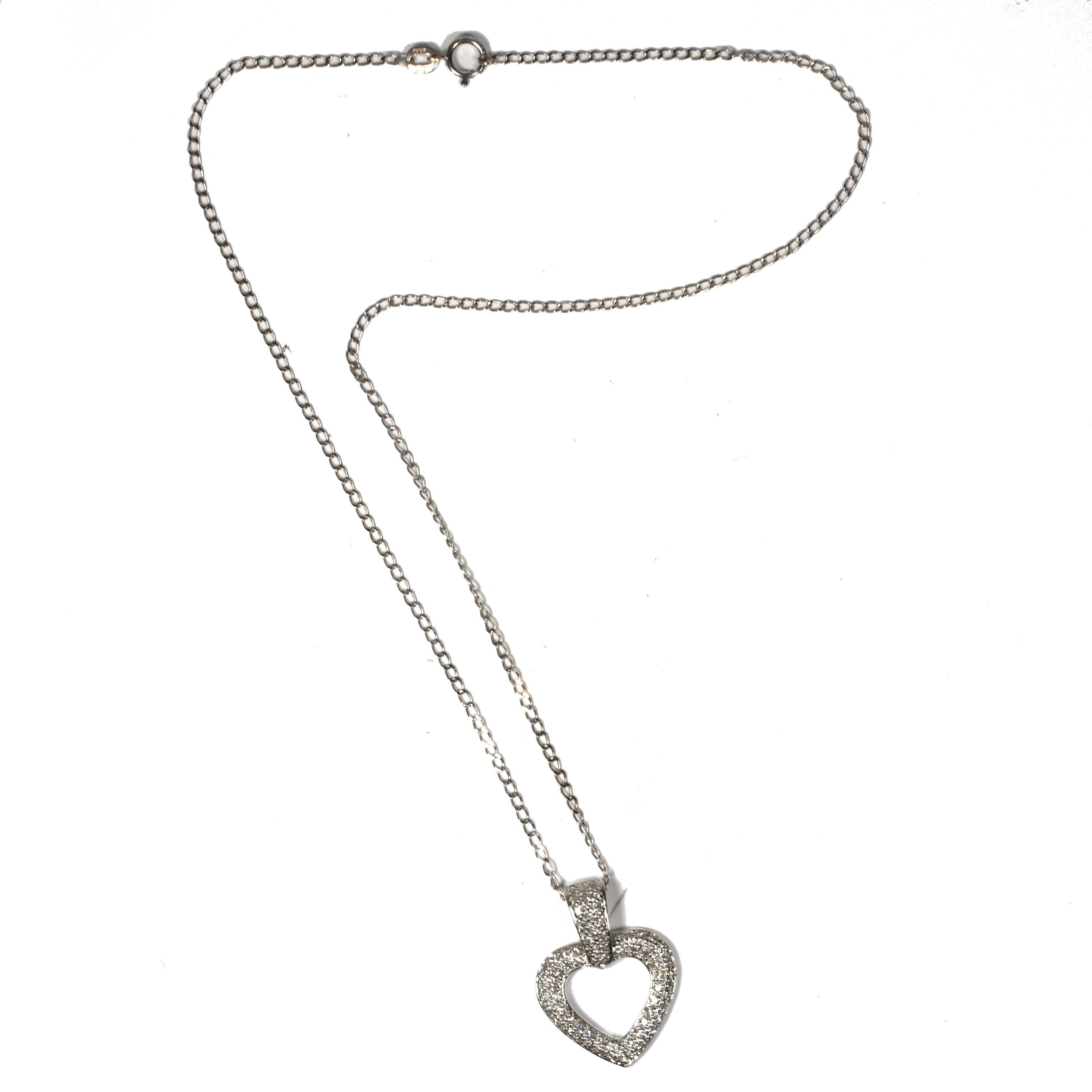 Timeless romantic and ultimate classic, the discrete charm of this lovely diamond heart pendant will make just the right statement when offered or worn! 
The 14k white gold perfectly complements the approx. 70 bright sparkling diamonds covering the