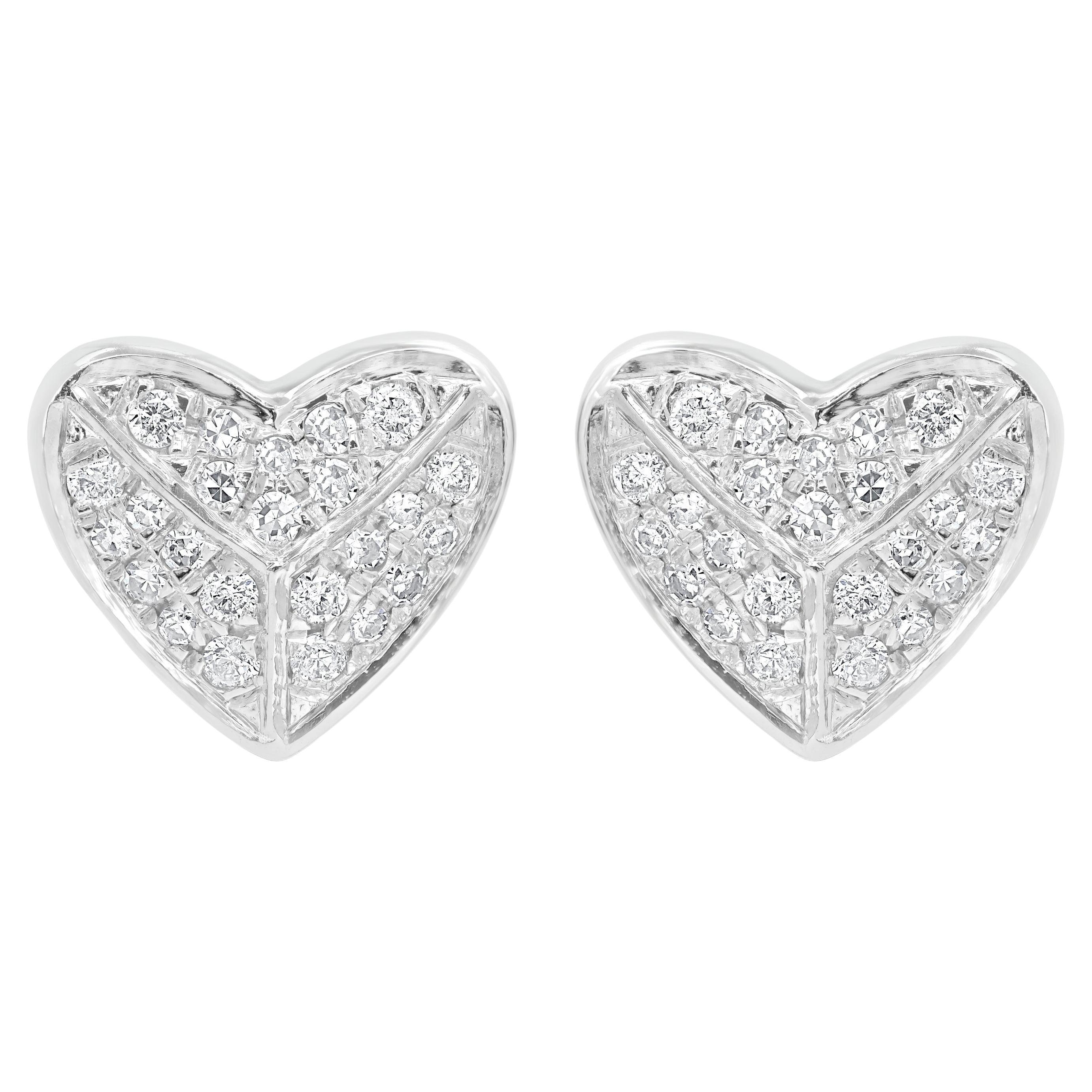 Add a romantic sparkle to your look with these Luxle stunning heart earrings made with 14k white gold and genuine diamonds. These heart-shaped stud earrings are adorable and small, and they're crafted just for you! This pair of 14K White Gold
