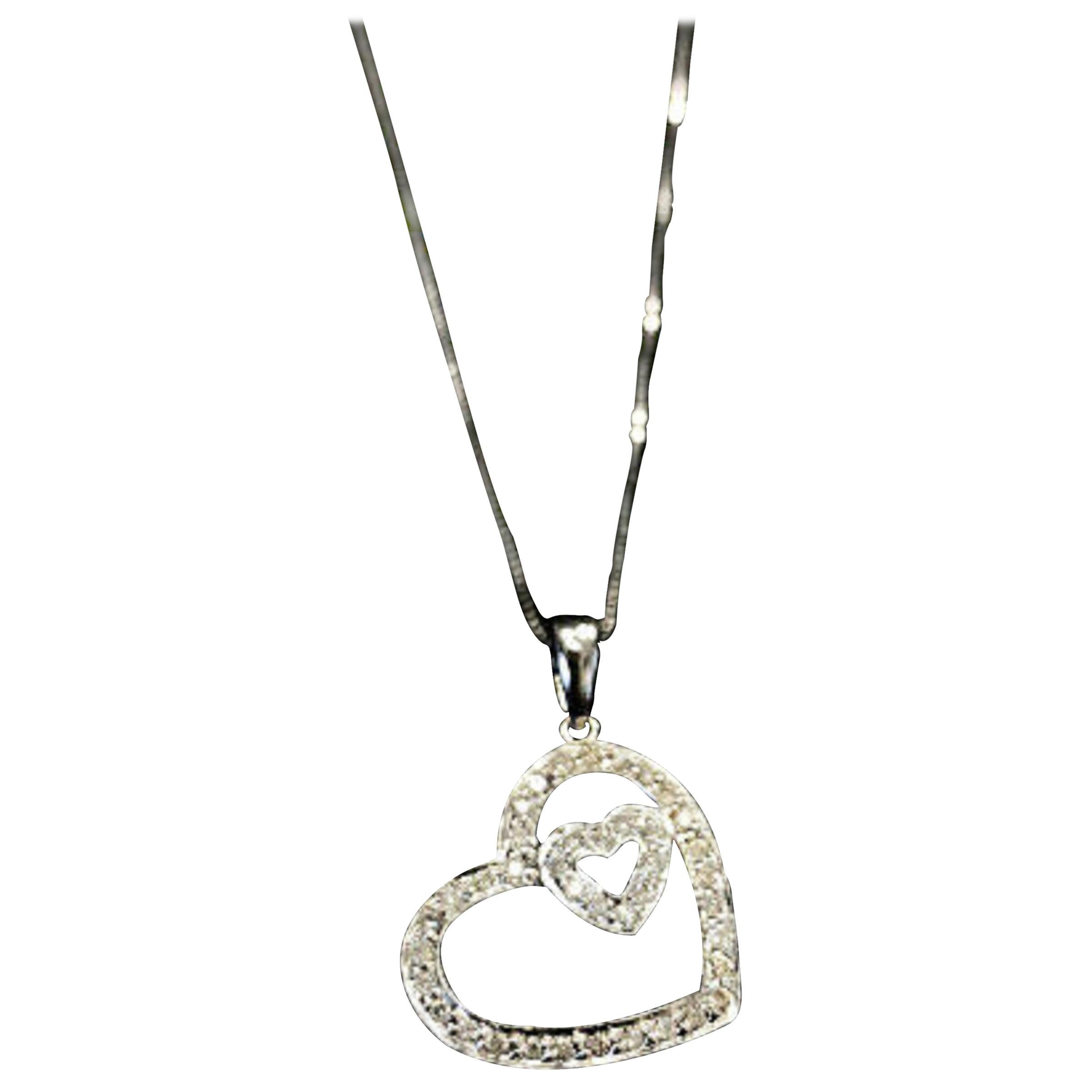 14 Karat White Gold Diamond Heart Within a Heart Pendant