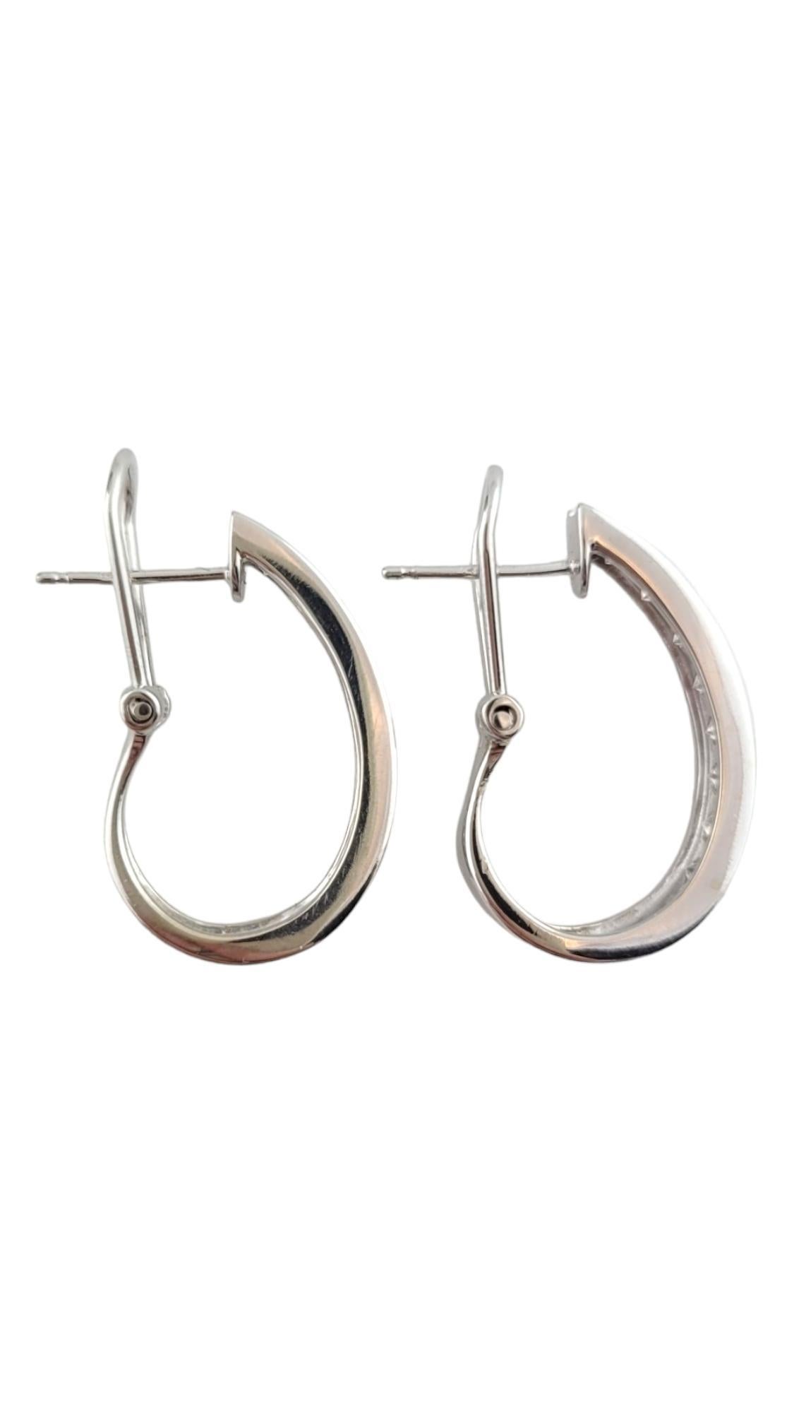 Vintage 14K White Gold Diamond Hoop Earrings

This gorgeous set of hoops were crafted from 14K white gold and feature 16 sparkling round brilliant cut diamonds!

Approximate total diamond weight: .72 cts

Diamond color: I

Diamond clarity: