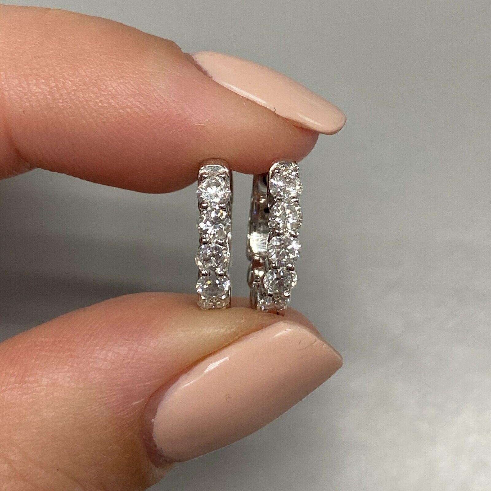 Specifications:
    main stone:DIAMONDS
    diamonds:10 PCS
    carat total weight: 0.61 ctw
    color:G-H
    clarity:SI3-I1
    metal:14K GOLD
    TYPE:     earrings
    weight:3.03 gr
    DIAMETER:0.5 INCH

