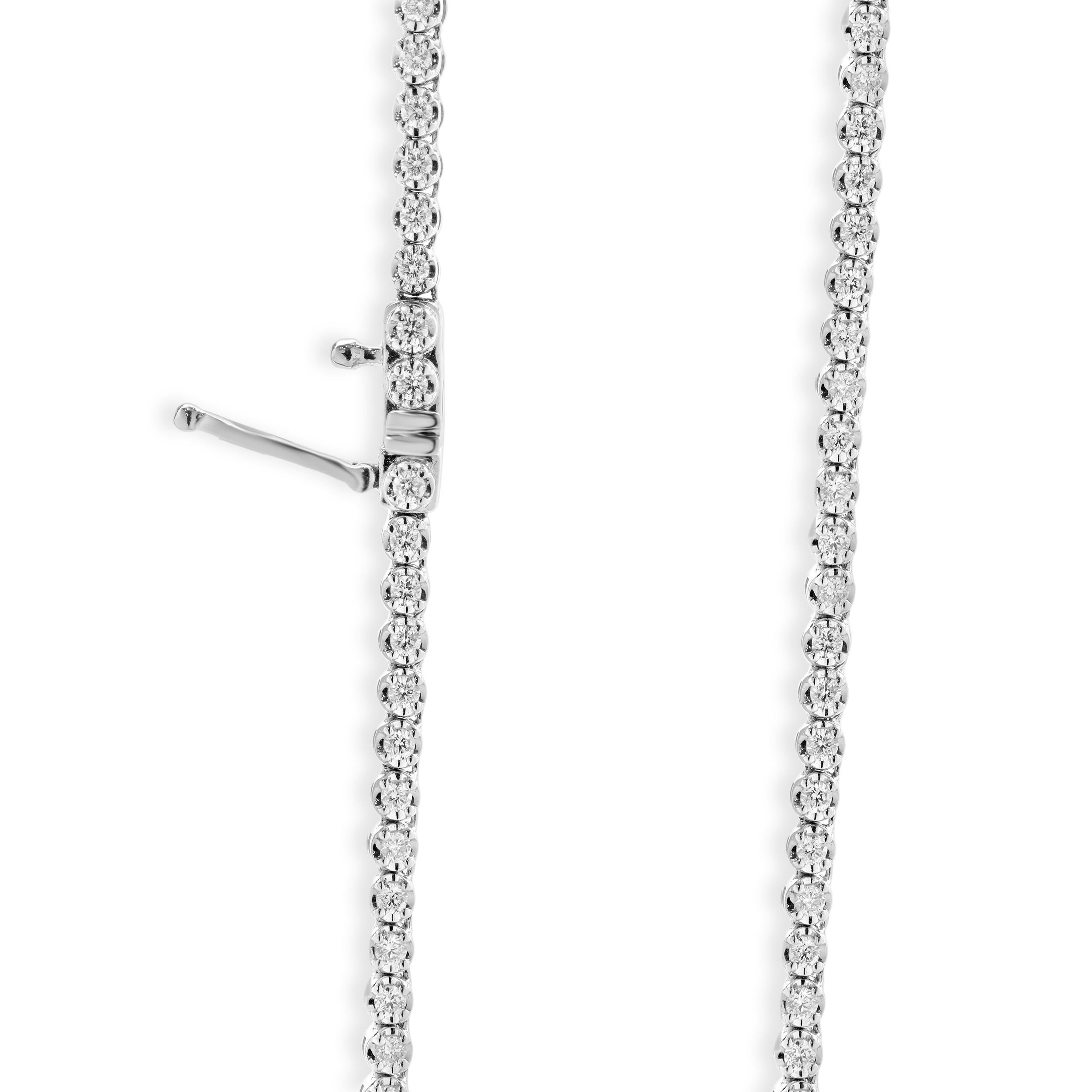 Designer: custom
Material: 14K white gold
Diamonds:  round brilliant Diamonds= 15.30cttw
Color: G
Clarity:VS-SI1
Dimensions: necklace measures 16.5-inches in length 
Weight: 28.15 grams

