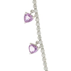 14k White Gold Diamond Inline Tennis Necklace with Pink Sapphire Heart Drops