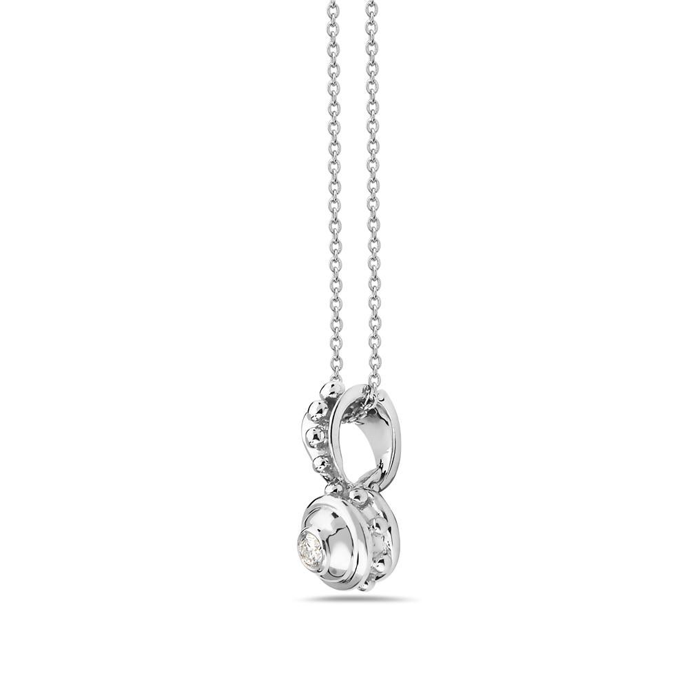This pendant necklace features 0.16 carats of round diamonds set in 14K white gold. 5.5 grams total weight. 8 inch chain drop. Made in USA.

Viewings available in our NYC showroom by appointment.