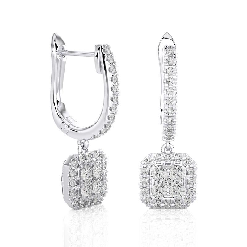 The Moonlight Cushion Cluster Earrings are an exquisite testament to elegance and grace. Crafted from 2.85 grams of lustrous 14K white gold, these earrings are a harmonious blend of delicacy and substance. The captivating design features a cluster